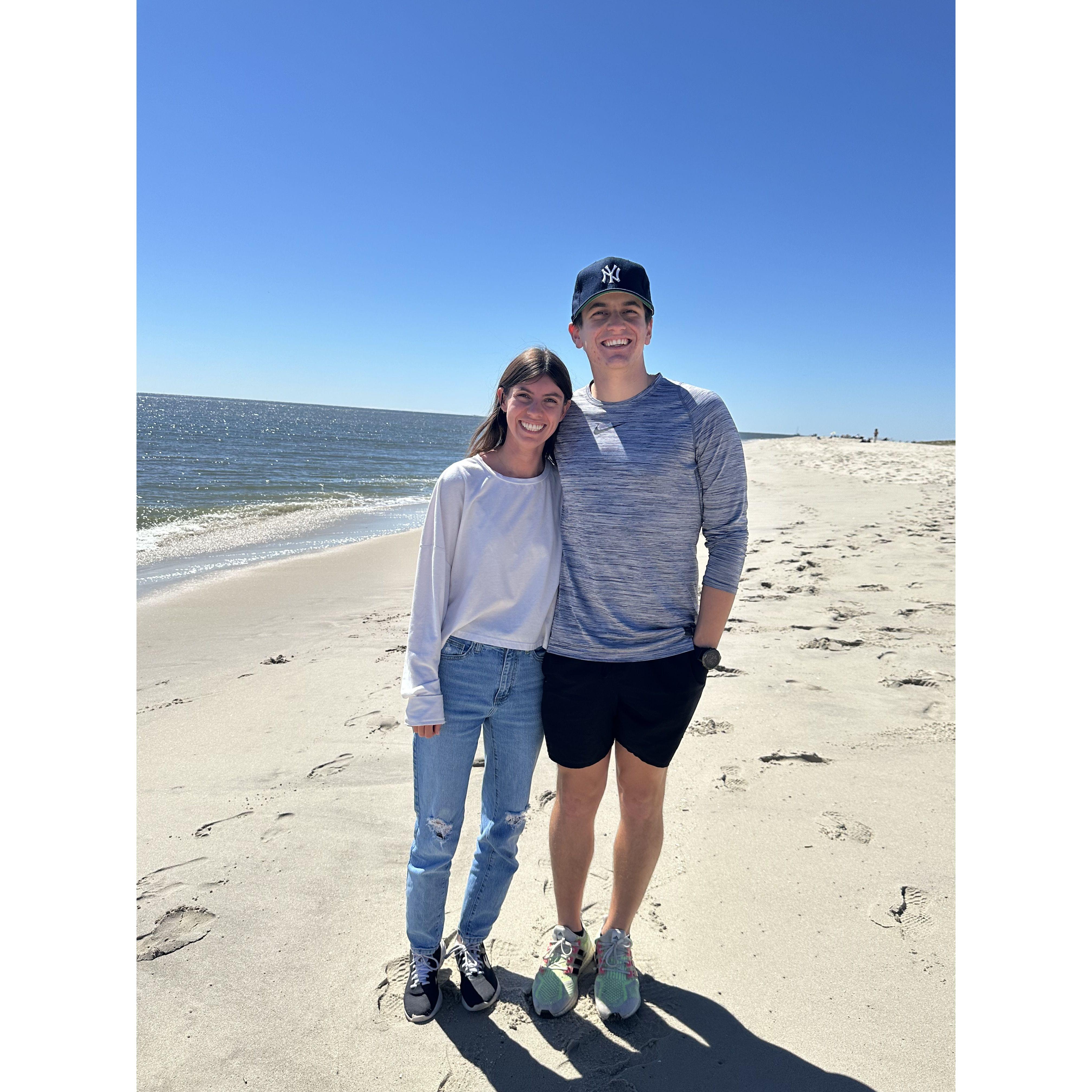 Exploring the beach in Cape May before a Cuneo family wedding