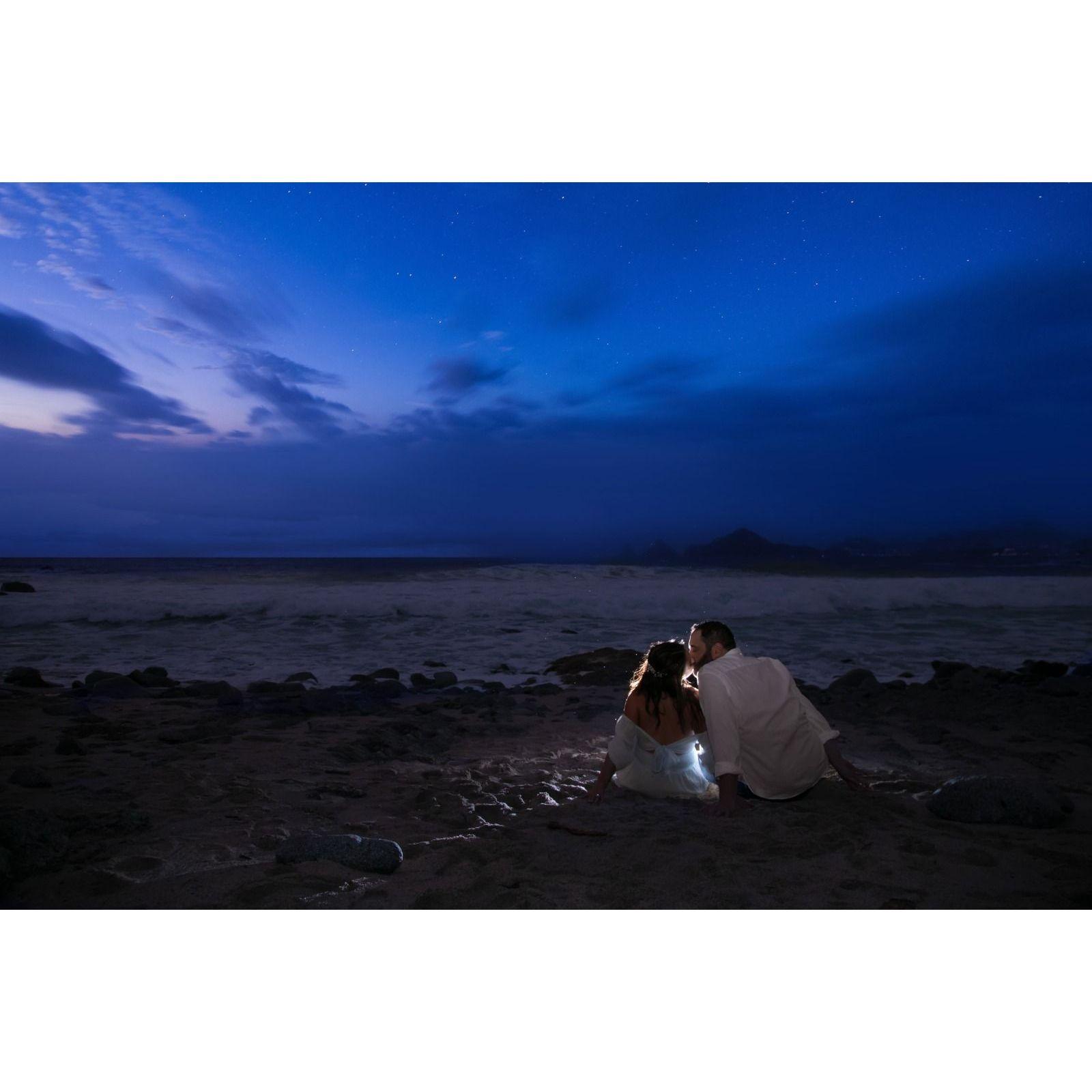 Post Proposal Moment when the sky started to rain and the thunder and lightening gave us a show.