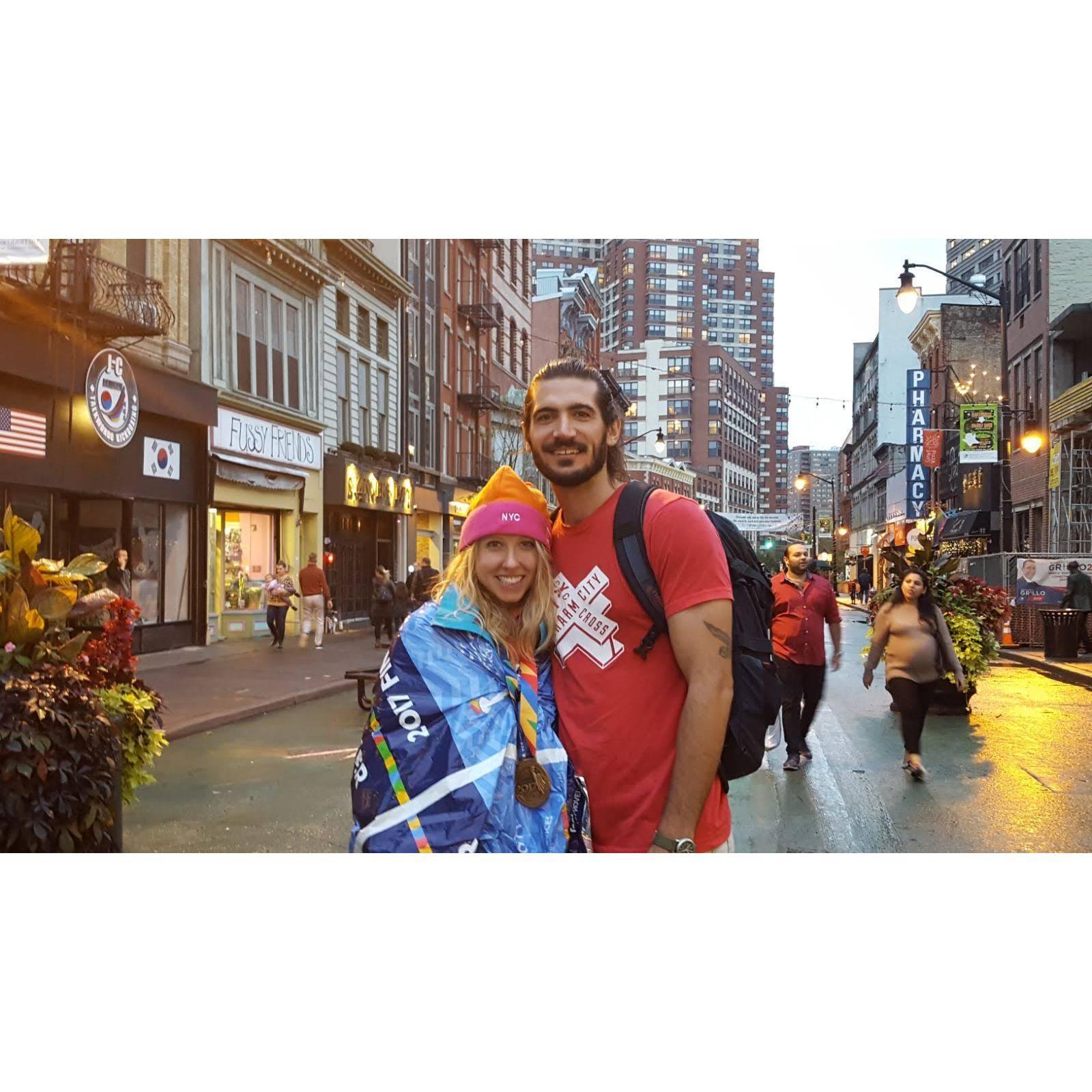 Kayla finishes the New York City Marathon and has her biggest cheerleader next to her at the end