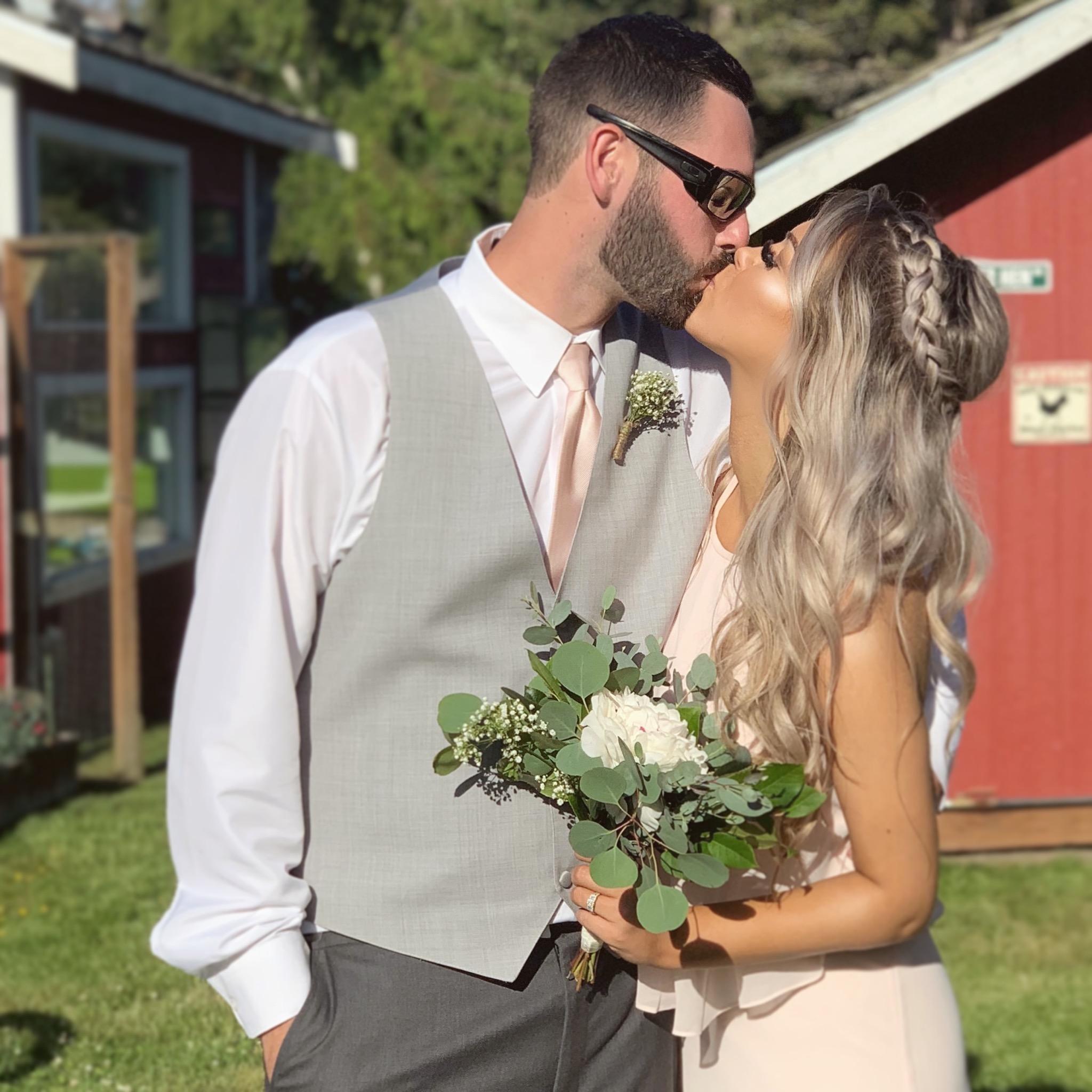 At one of their best friends' weddings, June 2019.