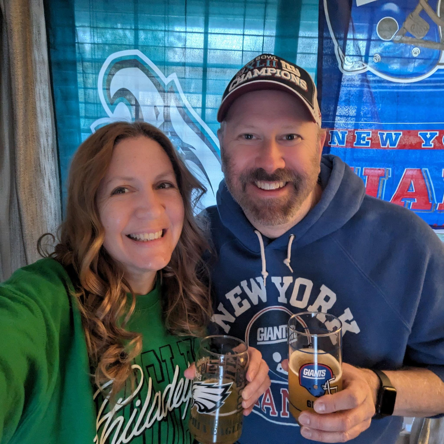 Draft day. Of course Jeff is wearing a championship hat from 15 years ago. I get to say that because I'm making the website. -Alicia Also, GO BIRDS!