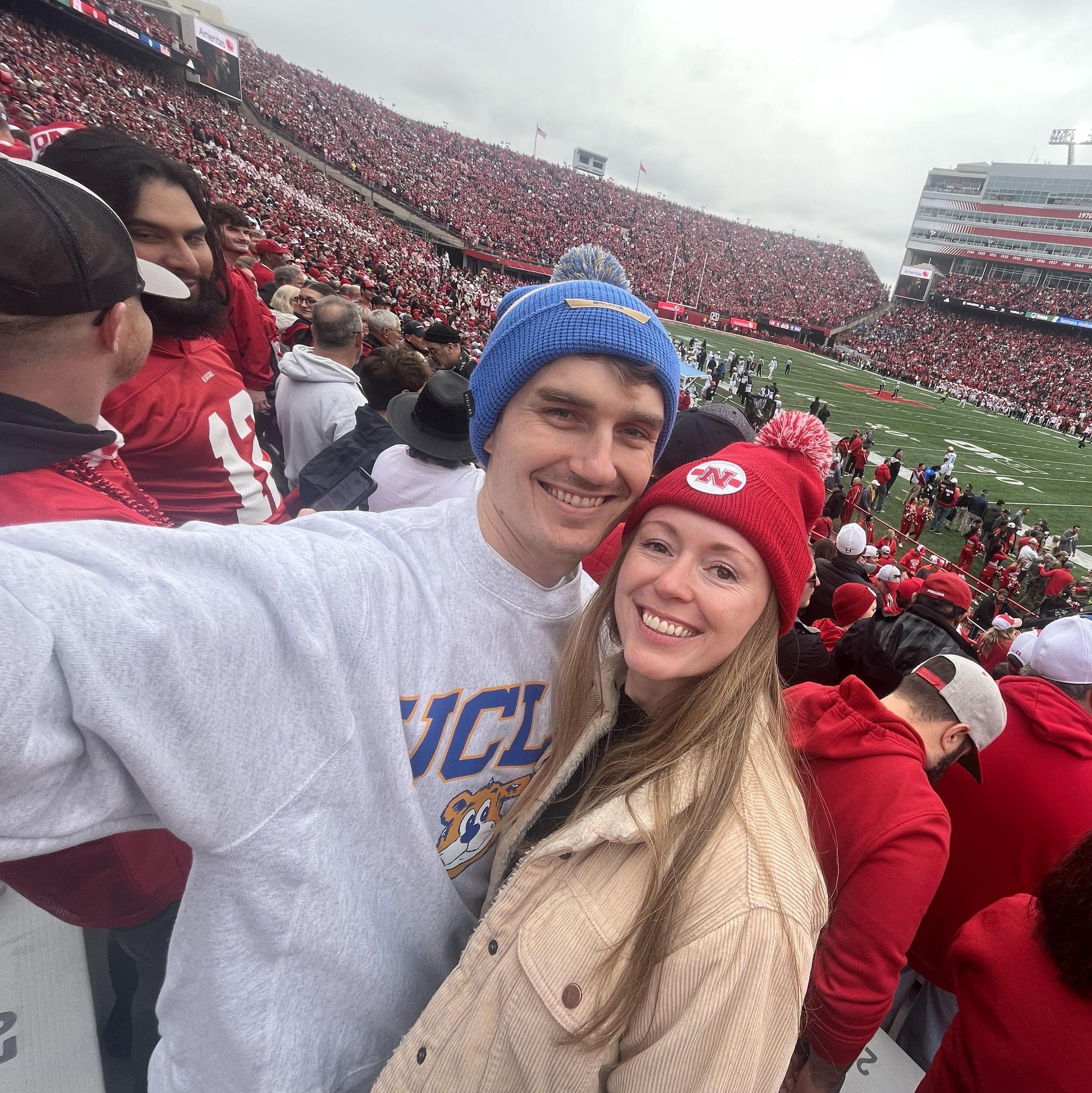 Cheering on our alma maters at the UCLA vs Nebraska football- a classic Big 10 rivalry game!