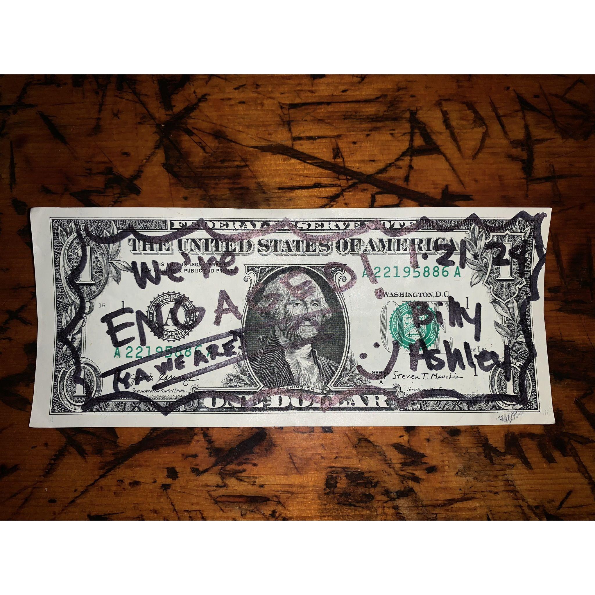 Our commemorative dollar bill at the Salty Dawg (2024)