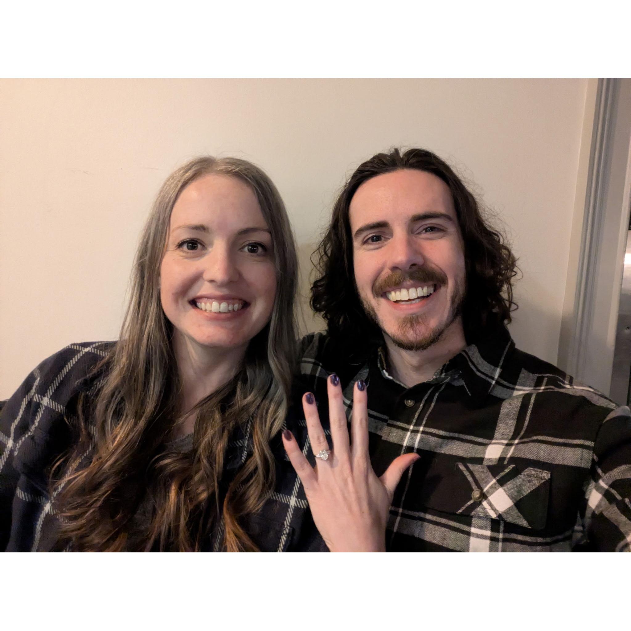 Waiting for dinner after Chris proposed!