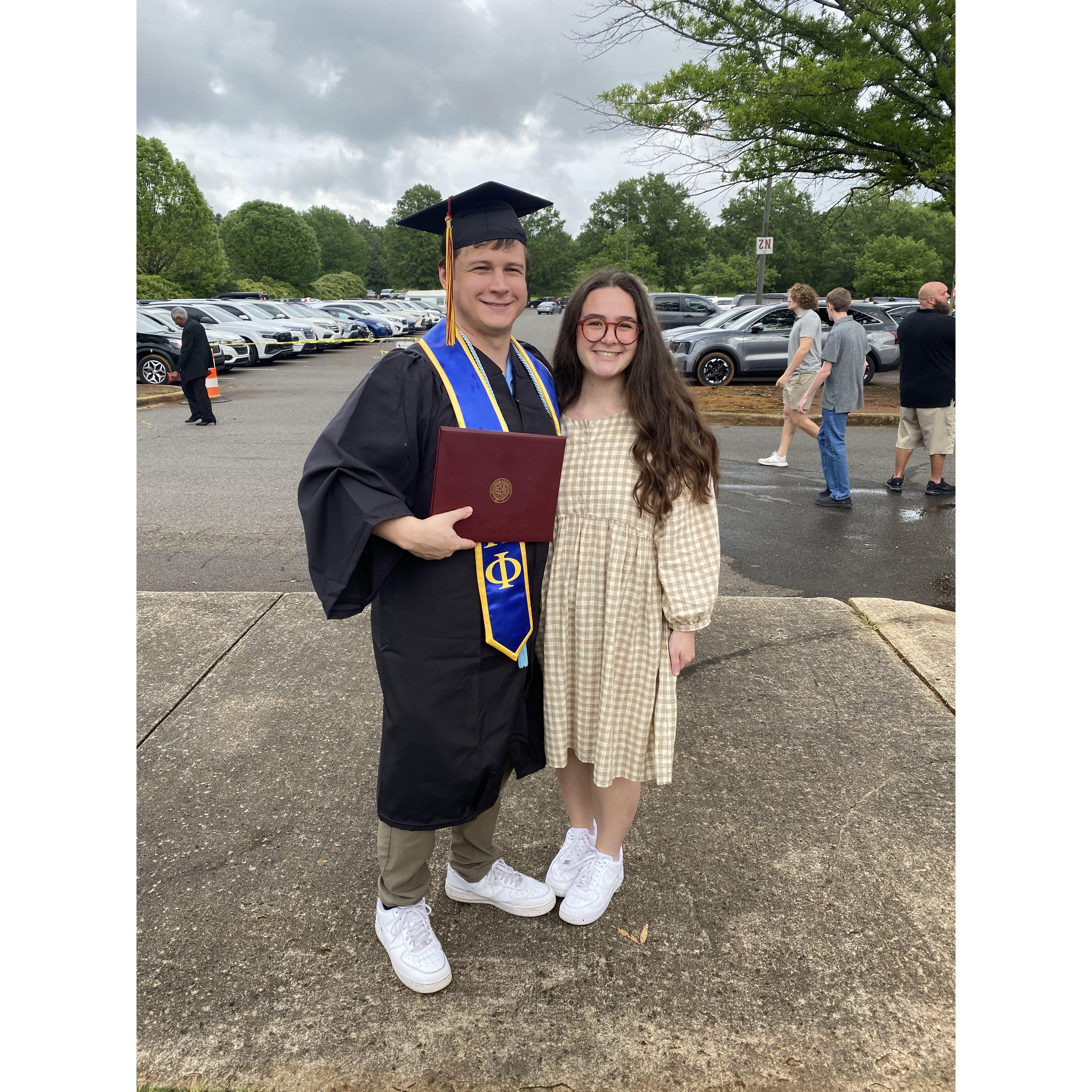 Dustin graduated from college in May of 2024 with a Middle Level Science Education degree with Piper and his family there to support him. Next up: wedding!
