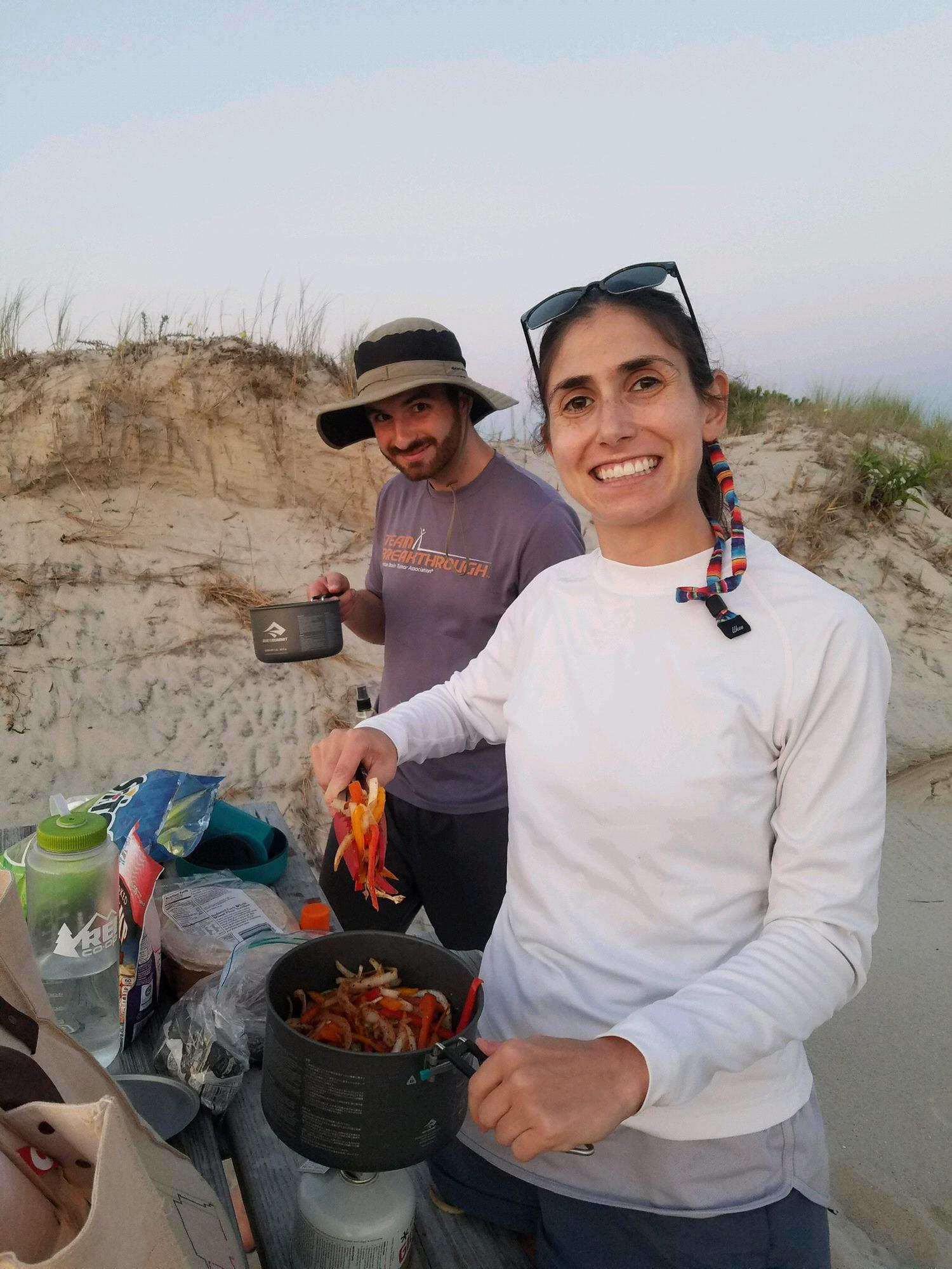 Charlotte is an expert beach taco maker. Taken during one of our favorite hikes: on Assateague Island with best man Adam Watkins!