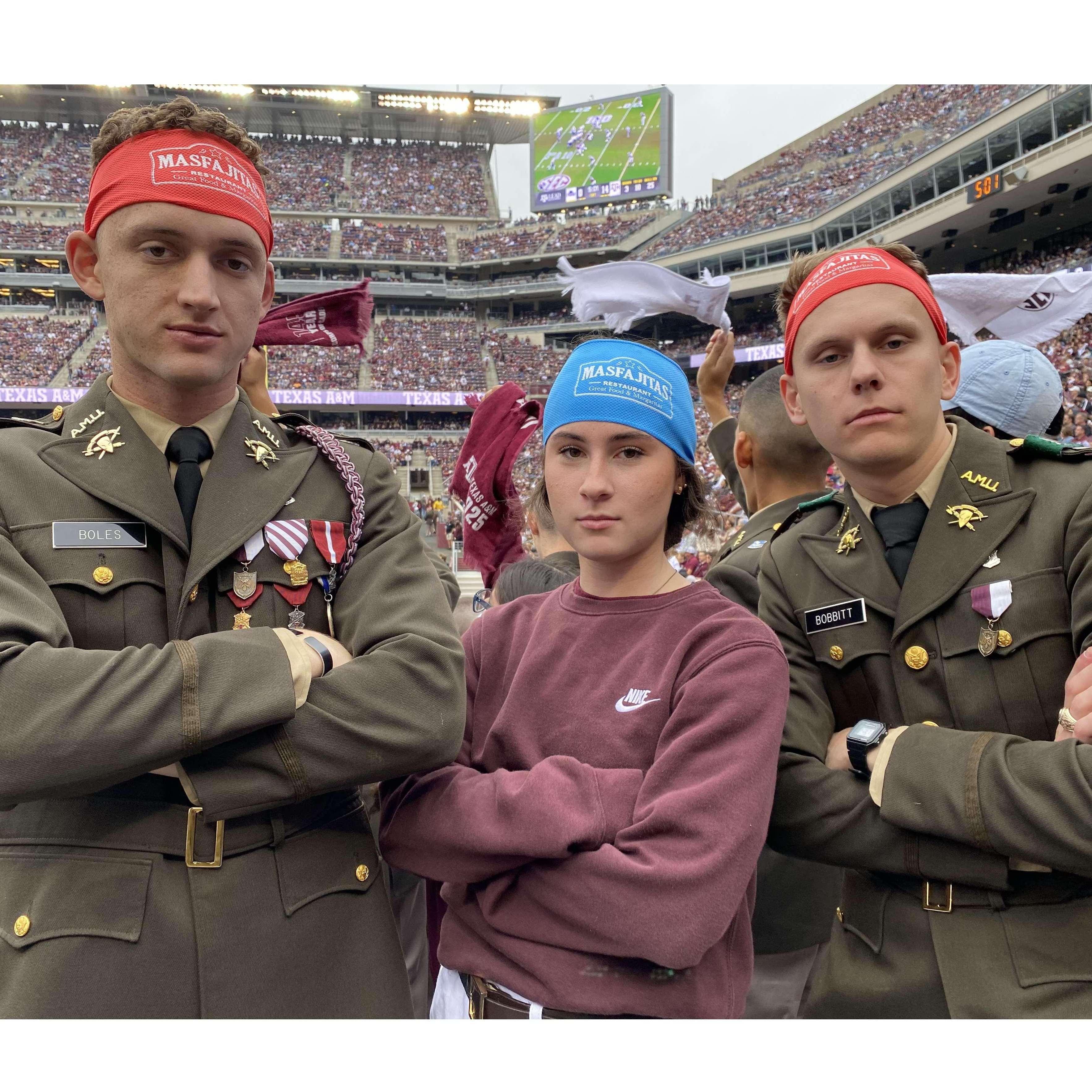 Here Nathan, my sister Olivia (our future maid of honor), and Trent (future best man) are flexing at a football game with free headbands. I was with the Cav; all the horse kids missed the headbands :(