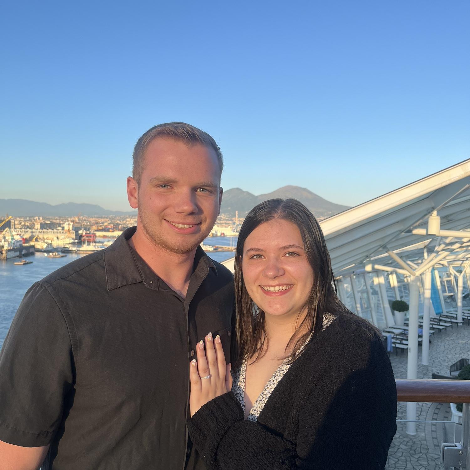 Our favorite unofficial engagement photo, taken on the Oasis of the Seas cruise ship at post outside of Capri, Italy where Cameron proposed!