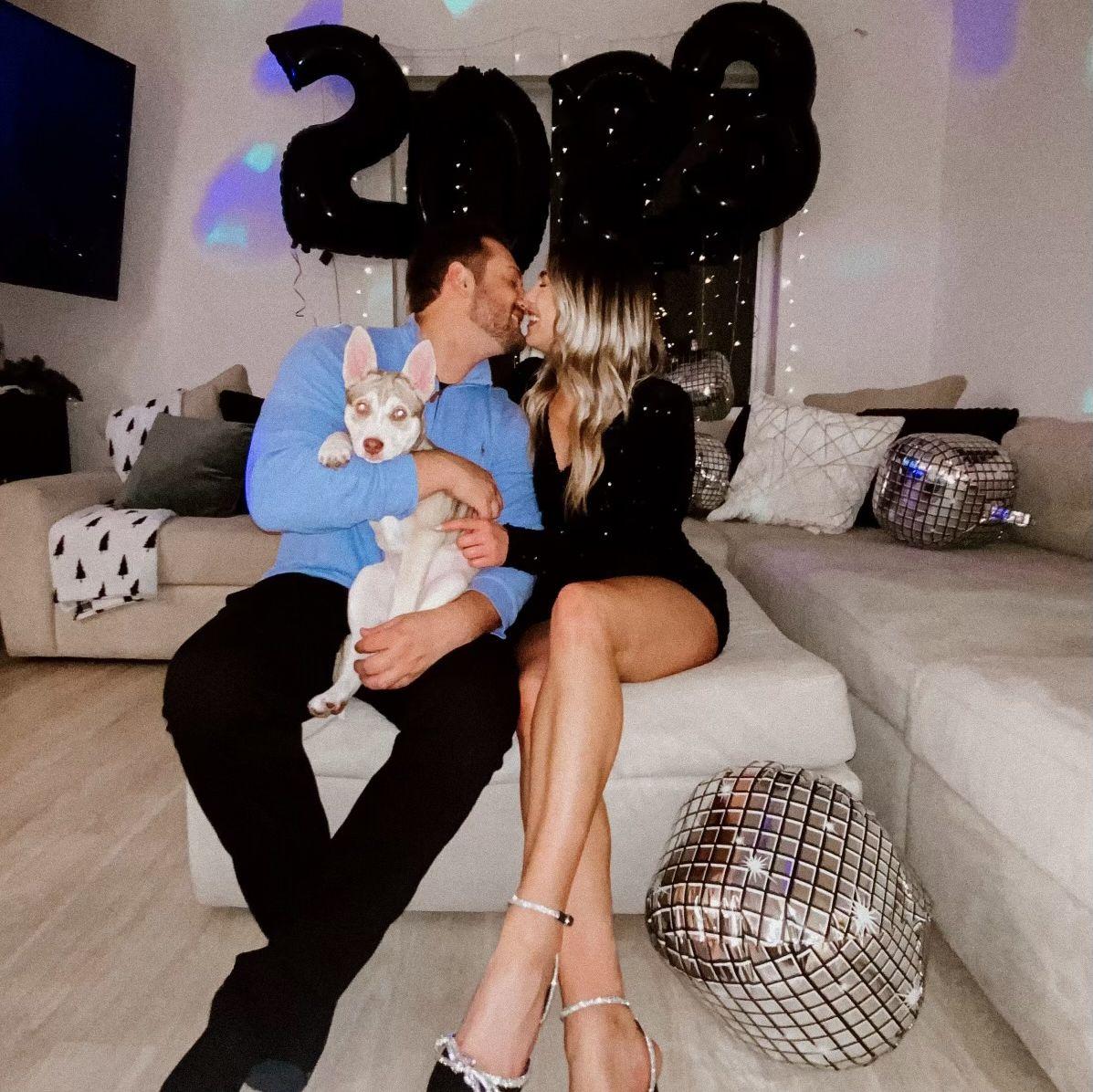 Celebrating our first NYE together, ringing in 2023. A New Years kiss to last forever!