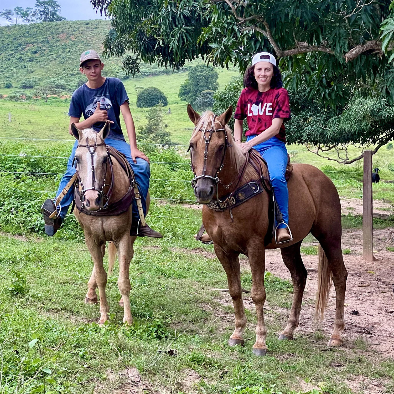 Tati & ner nephew on the farm in Brazil.