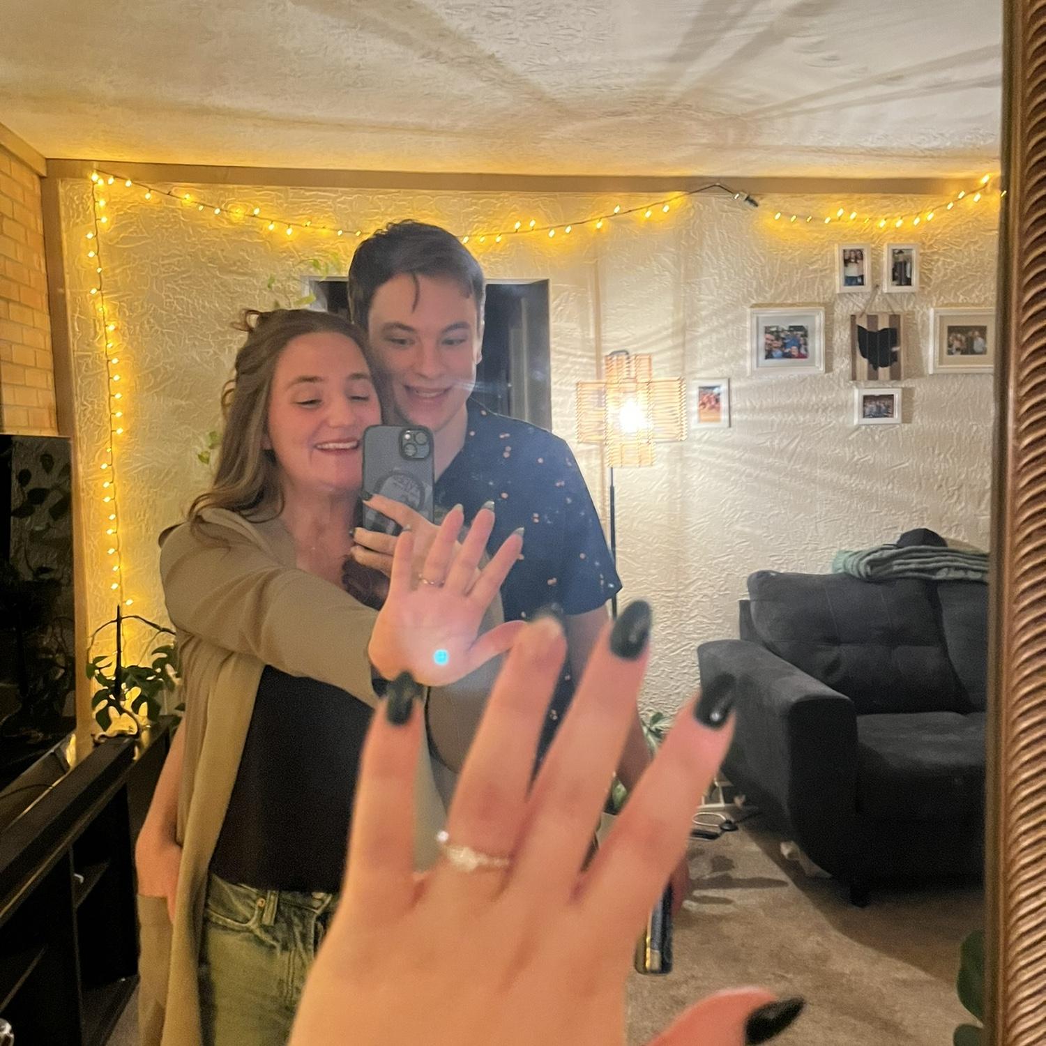 On our 7 year anniversary, Kyle proposed on Lovers Lane 💞