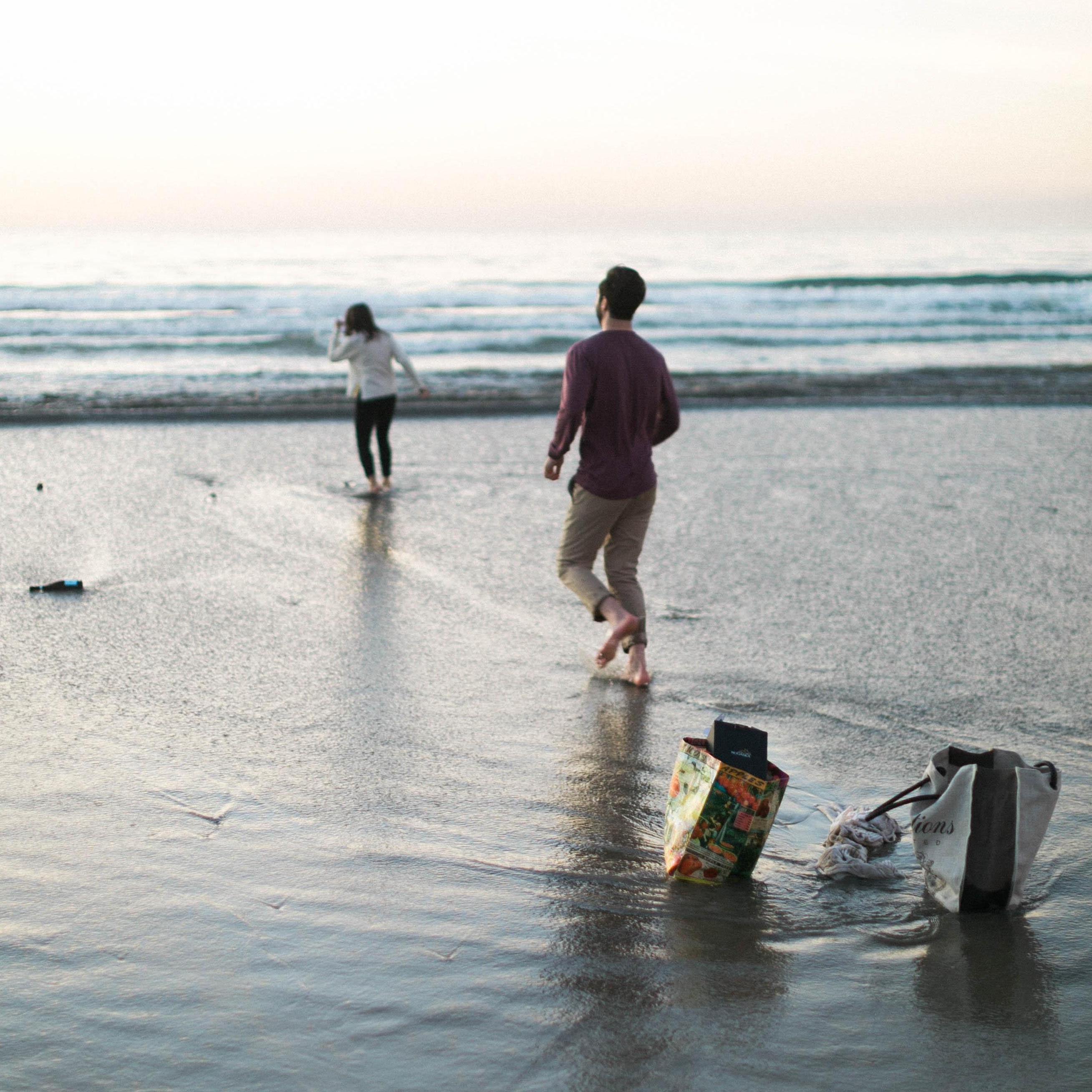 Chasing down all our stuff during the engagement shoot that got swept away!!