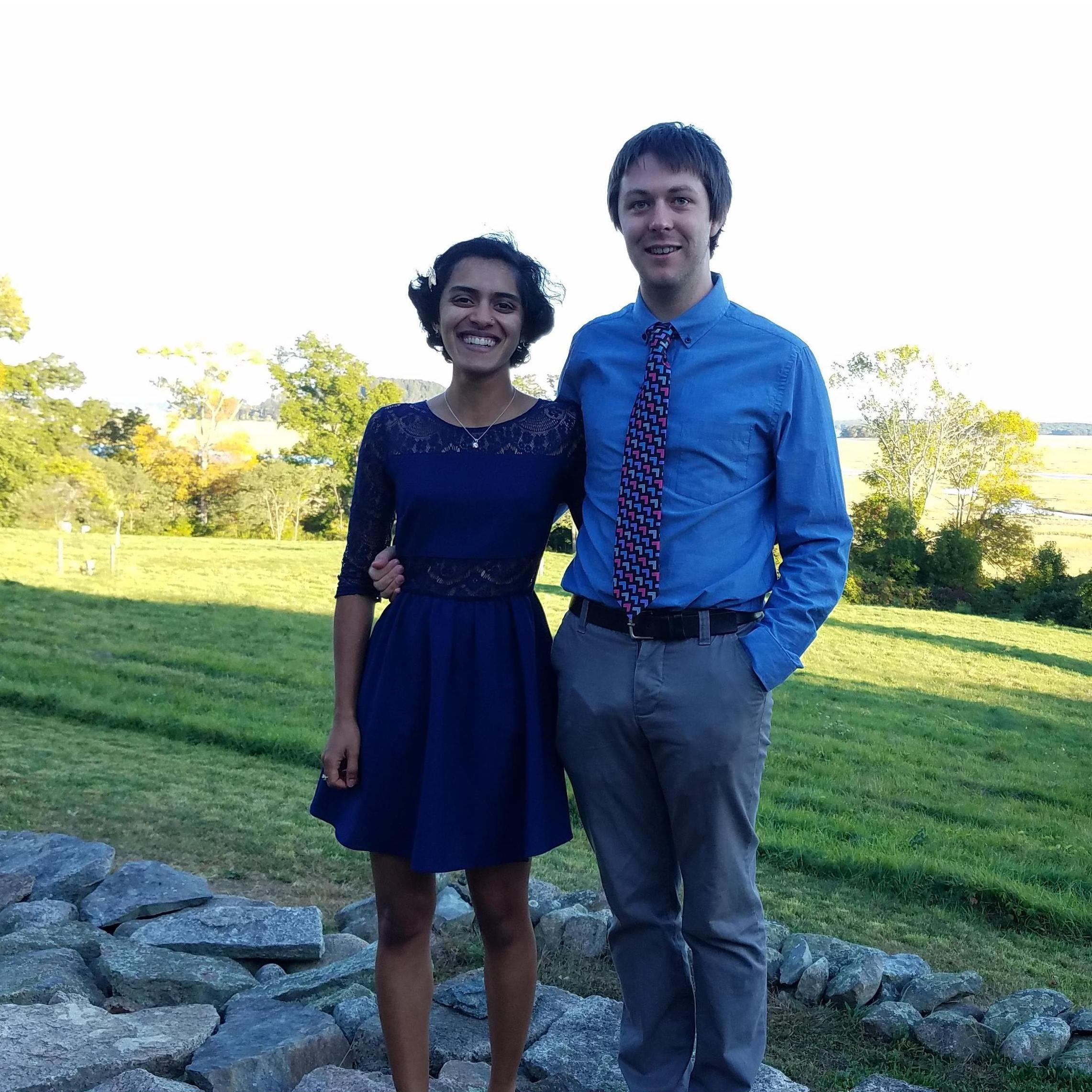 At the wedding of David's friend and bandmate, Frank, to Lauren.