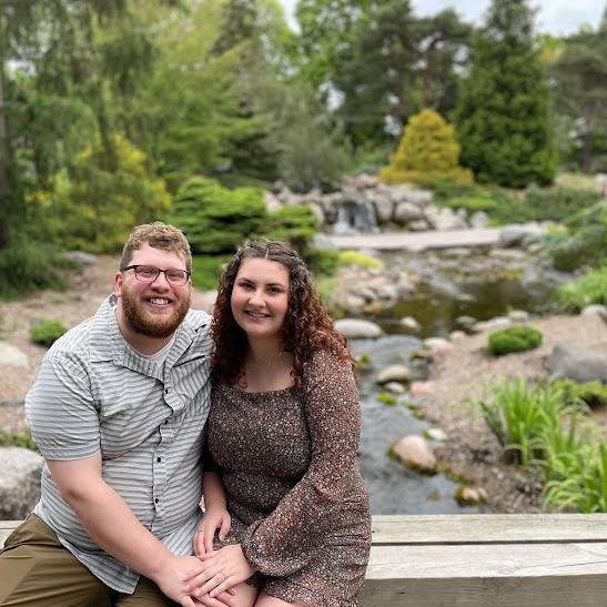 Us Infront of the waterfall where we got engaged.