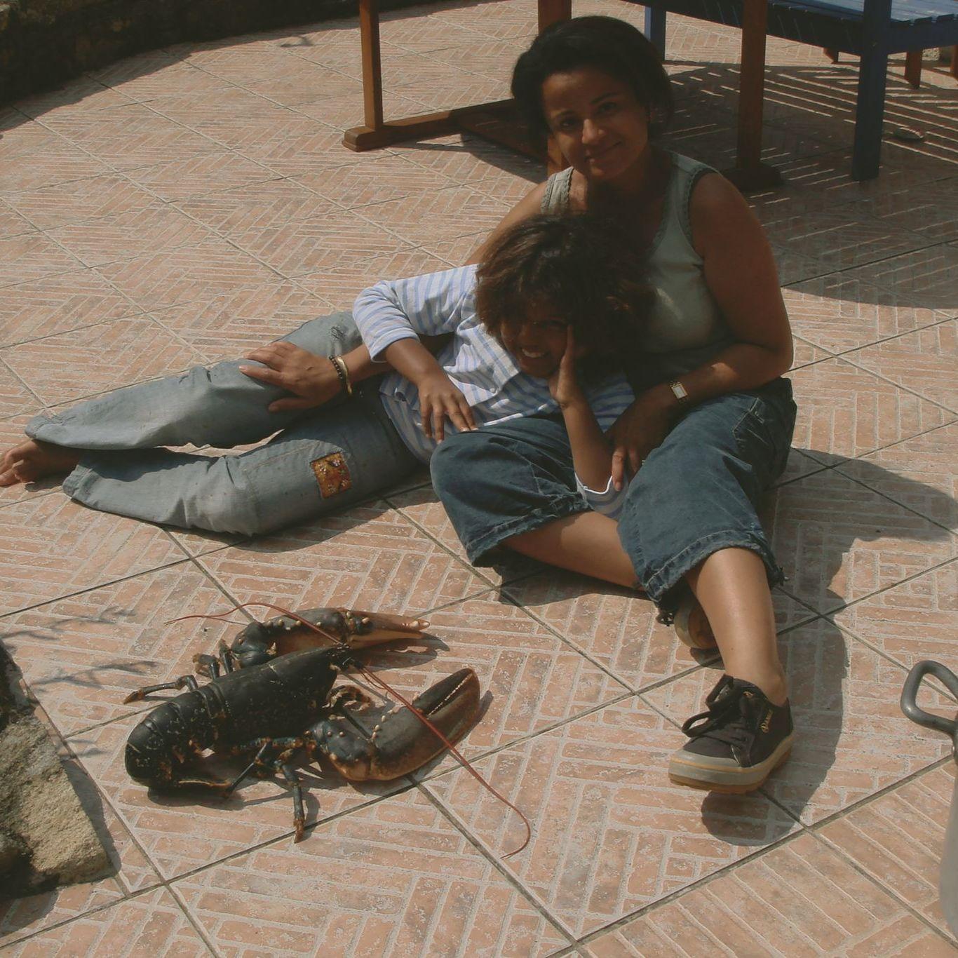 Basking in the sun together in îles aux moines after Debbie won a prize raffle lobster!