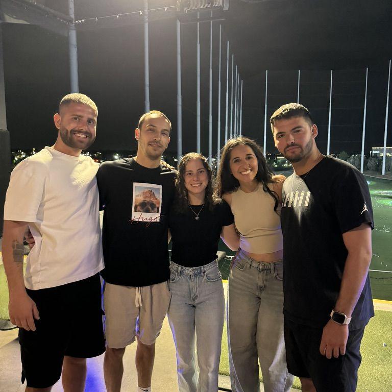 Our first picture together! Outing to top golf :)