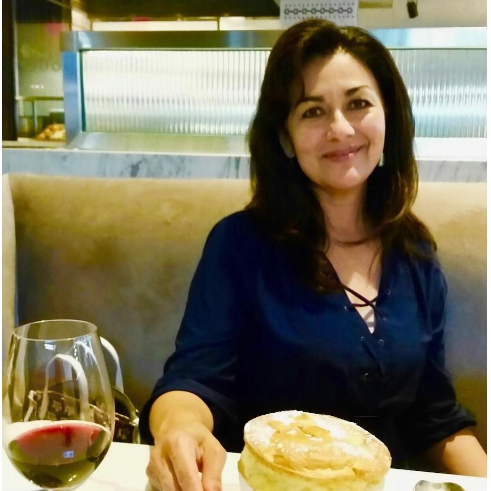 Norma loves soufflé and wine, but loves David even more!