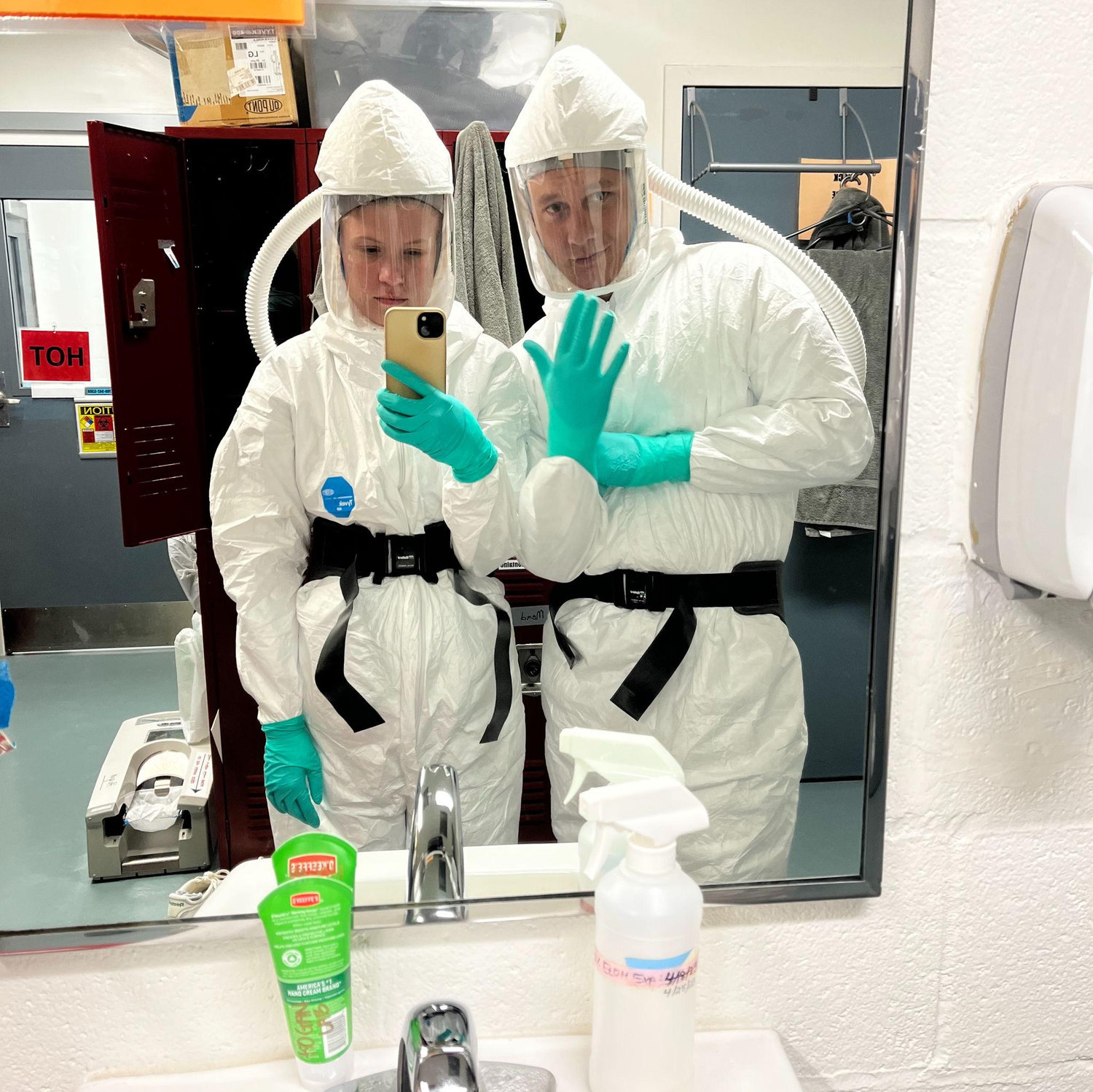 One of the few pictures we have together actually working. We spent some time in the high containment facility doing some bird flu work!