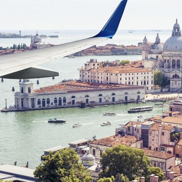 Two Round Trip Plane Tickets to Italy