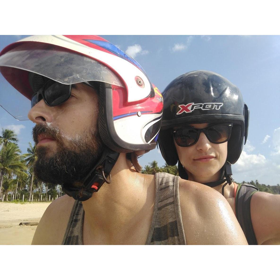 Trusting Alex with our lives on a motorcycle on the beach in the Philippines. Also an example of how Alex applies his sunscreen. :] Spring 2016