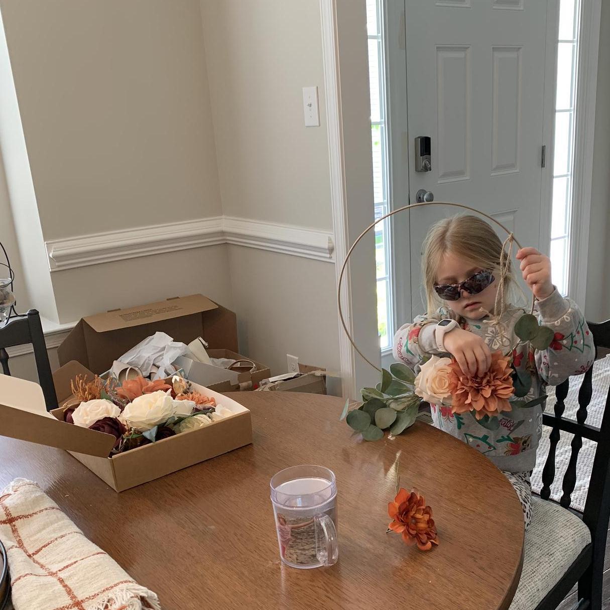Izzie working on decorations (May)