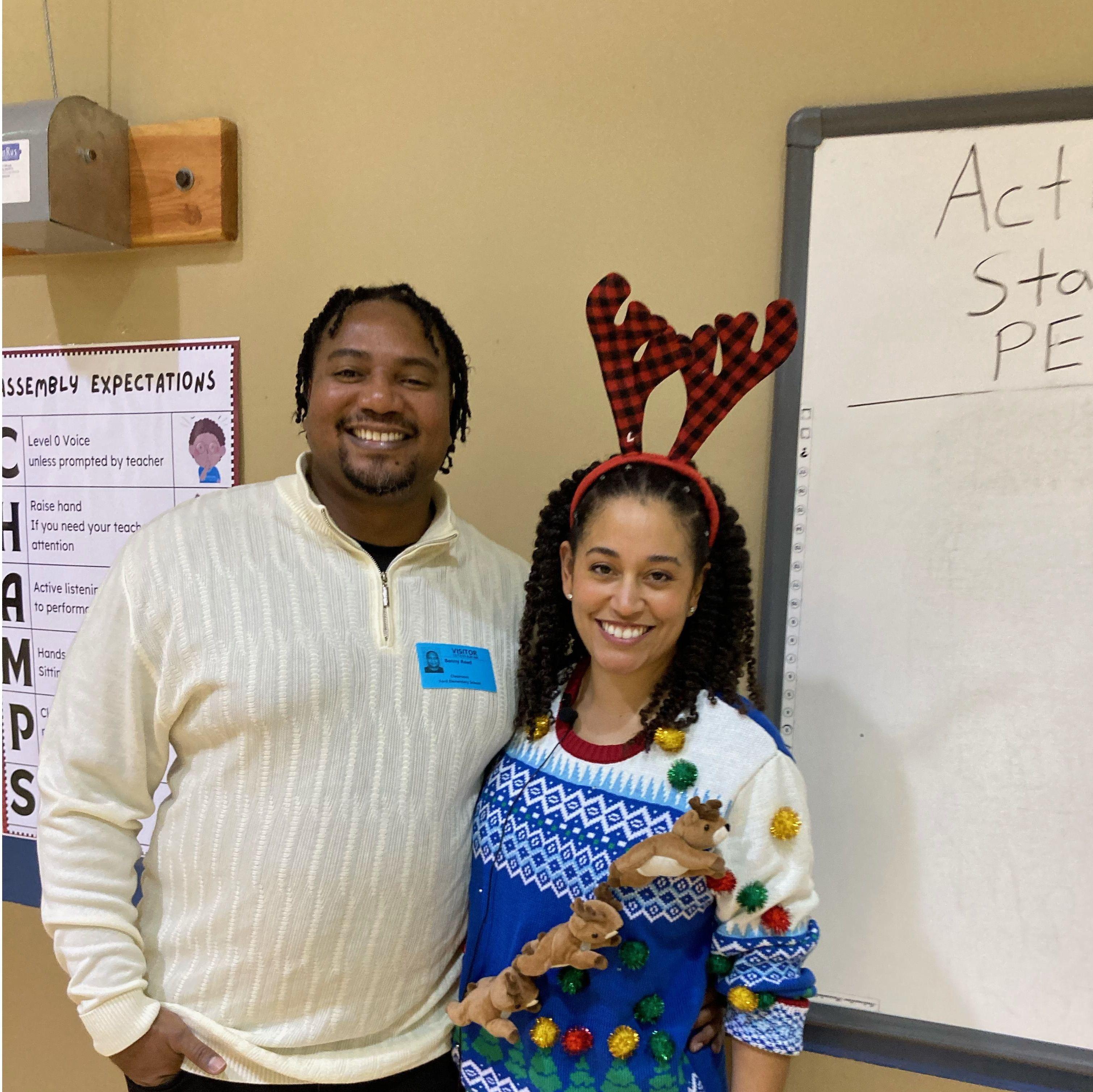 Heather's 4th-grade students' Holiday school Musical. Benny shows his support as Heather swoons.