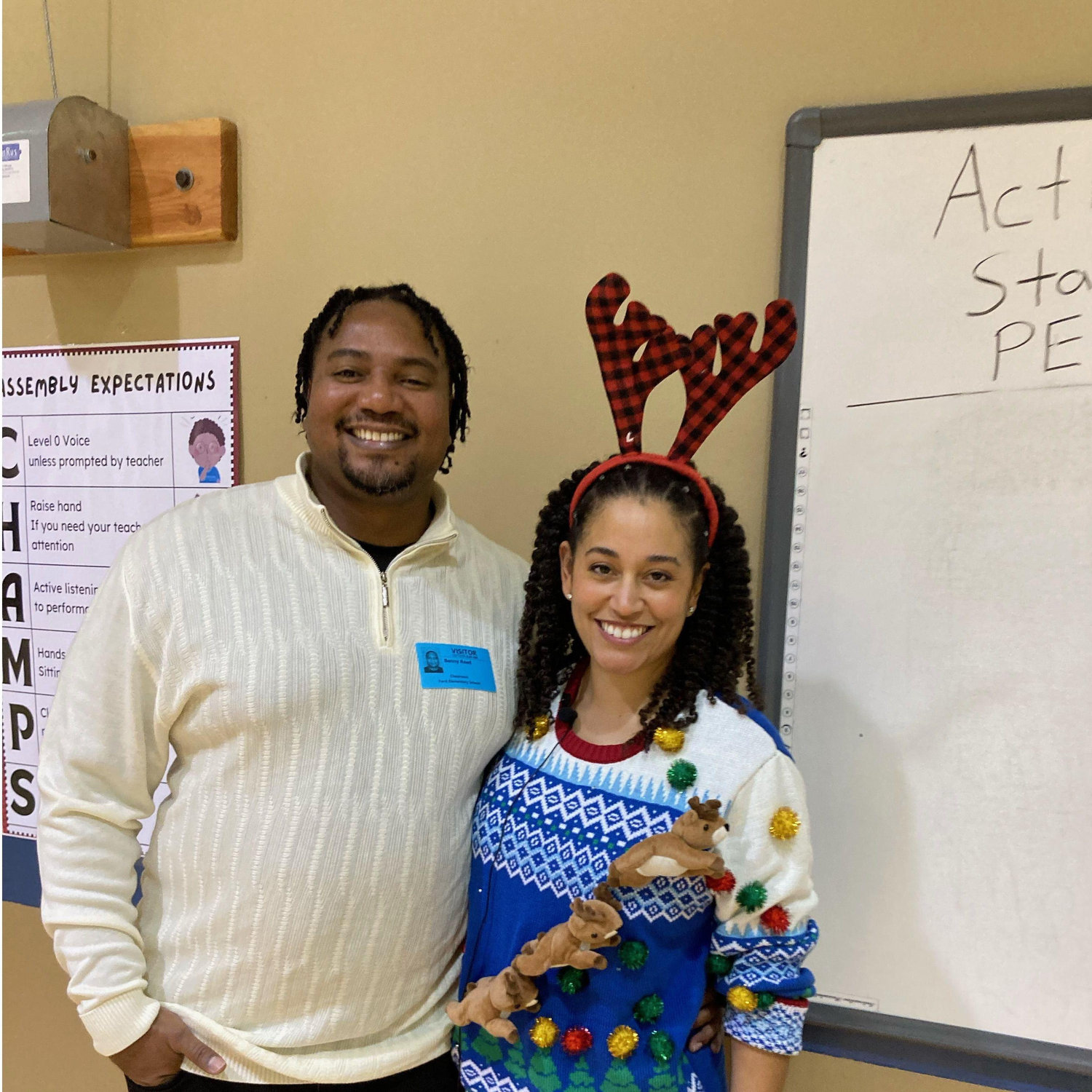 Heather's 4th-grade students' Holiday school Musical. Benny shows his support as Heather swoons.