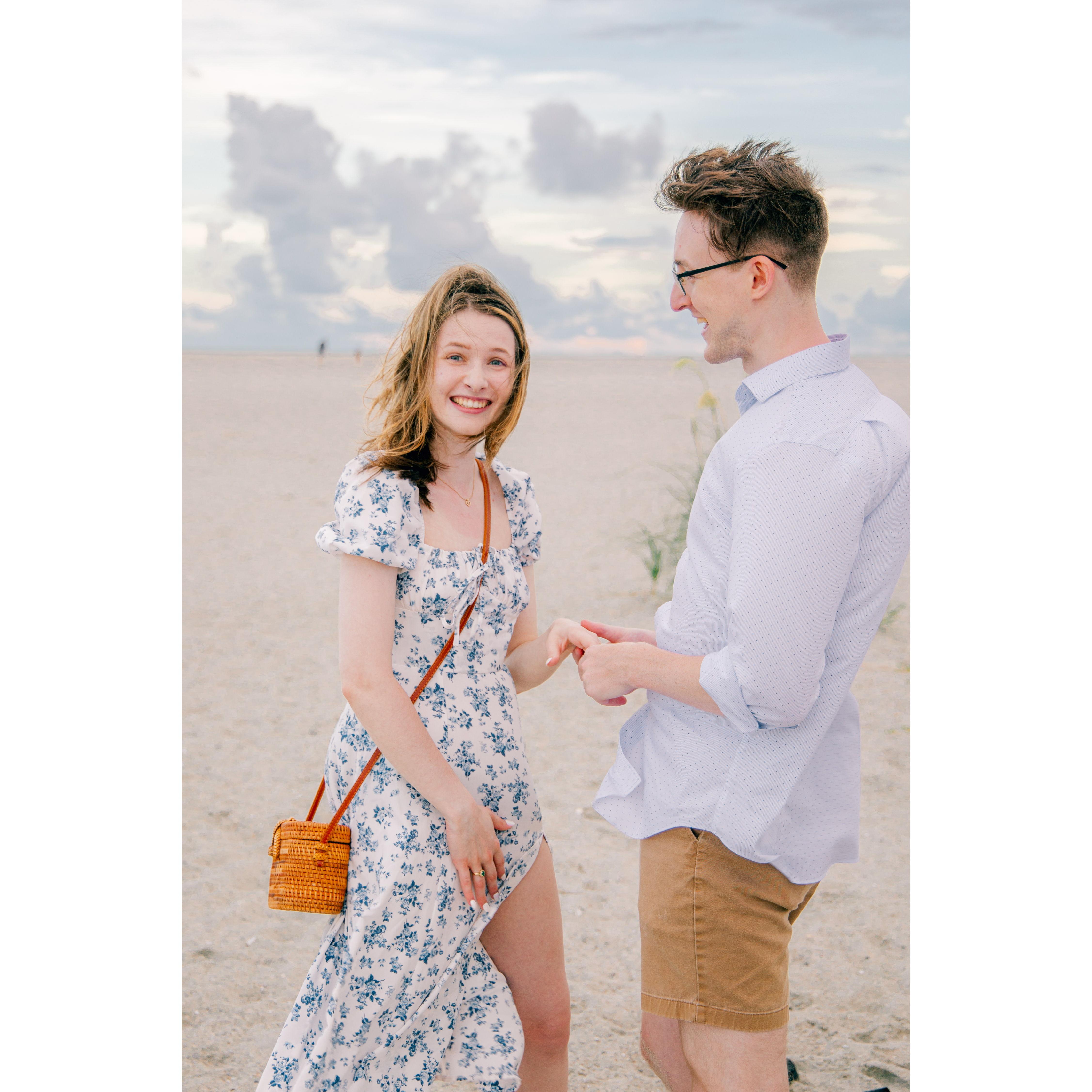 After of course saying yes, Emily realized there was a photographer capturing the special moment.