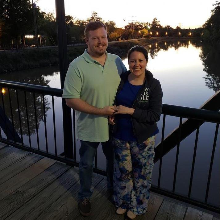 This is right after Jared proposed at the Riverwalk at sunset.