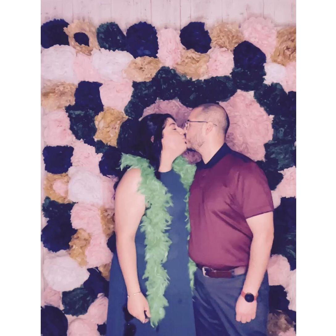 Smoochin' at our friend's wedding ;)