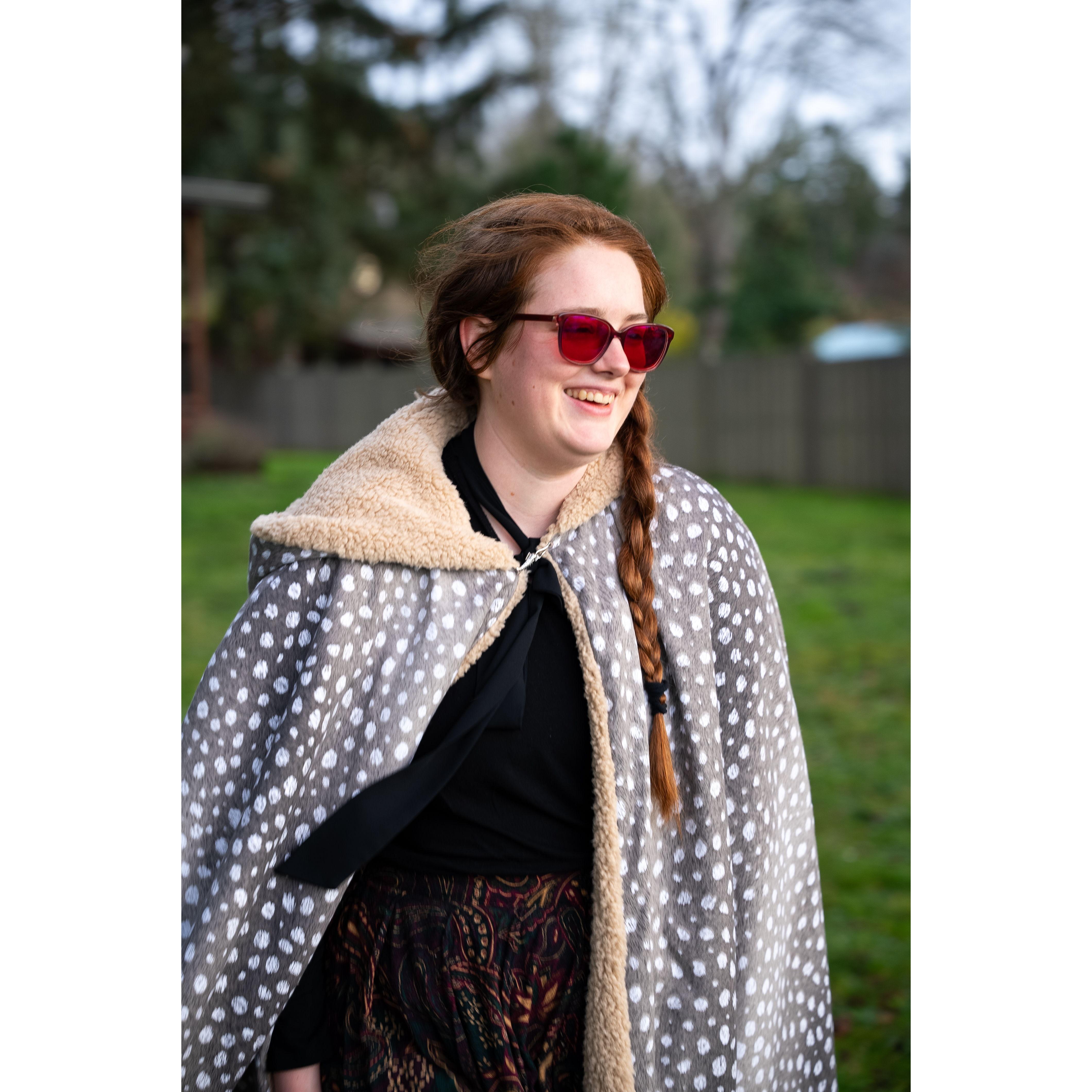 Teal, Casper's younger sibling, walking down the aisle before the couple
