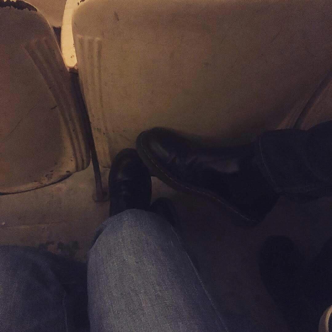 Readying our feet for movie time at a favorite date spot, Manlius Art Cinema. We have multiple pairs of shoes that match. This is only one such set.