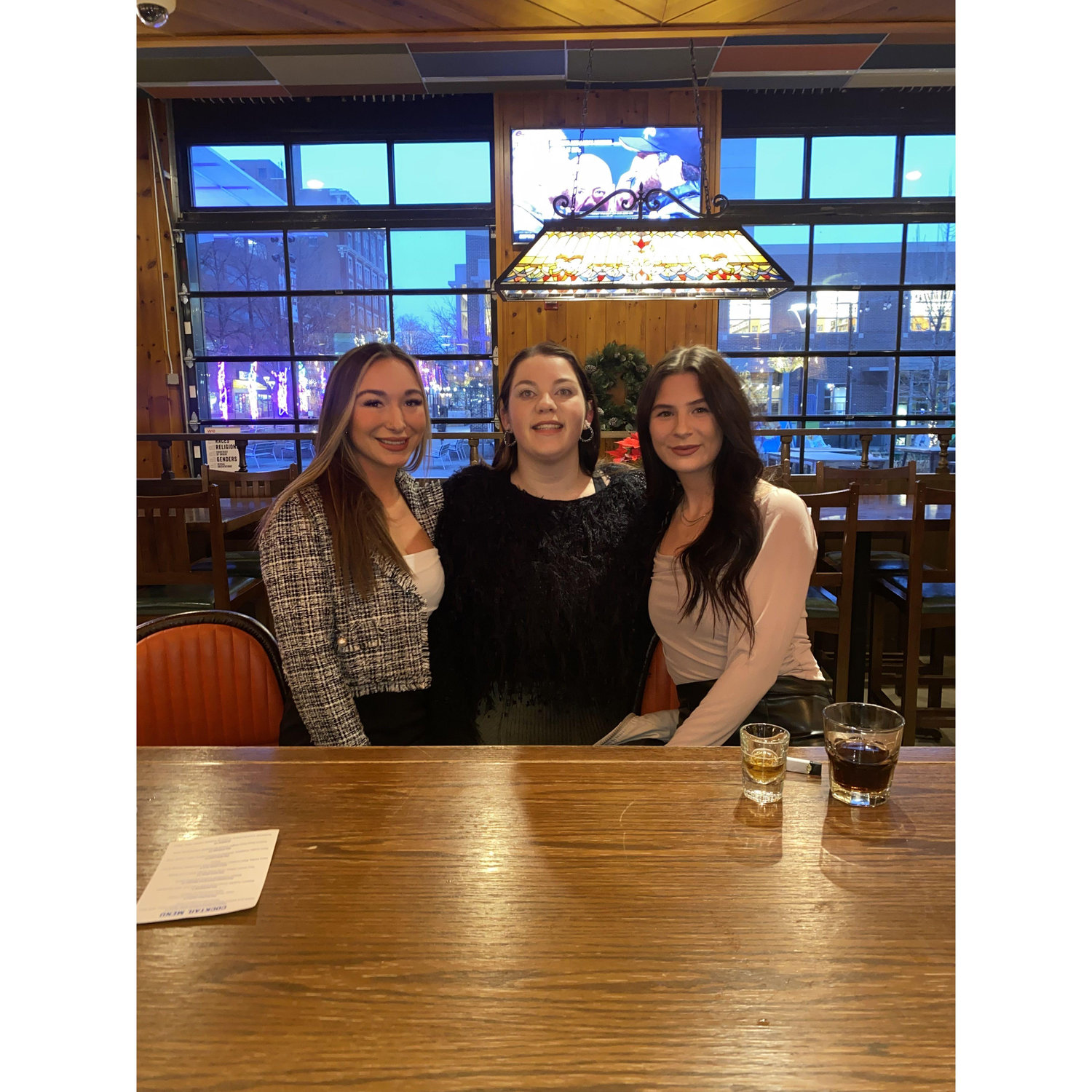 Stephanie, Erika, and I before the company Christmas party.