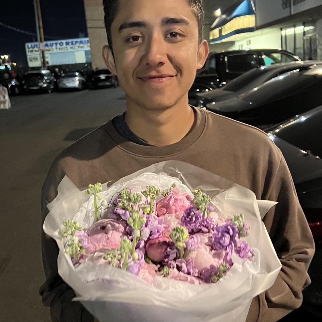 The night Bryan asked Irma to be his girlfriend with her favorite flowers