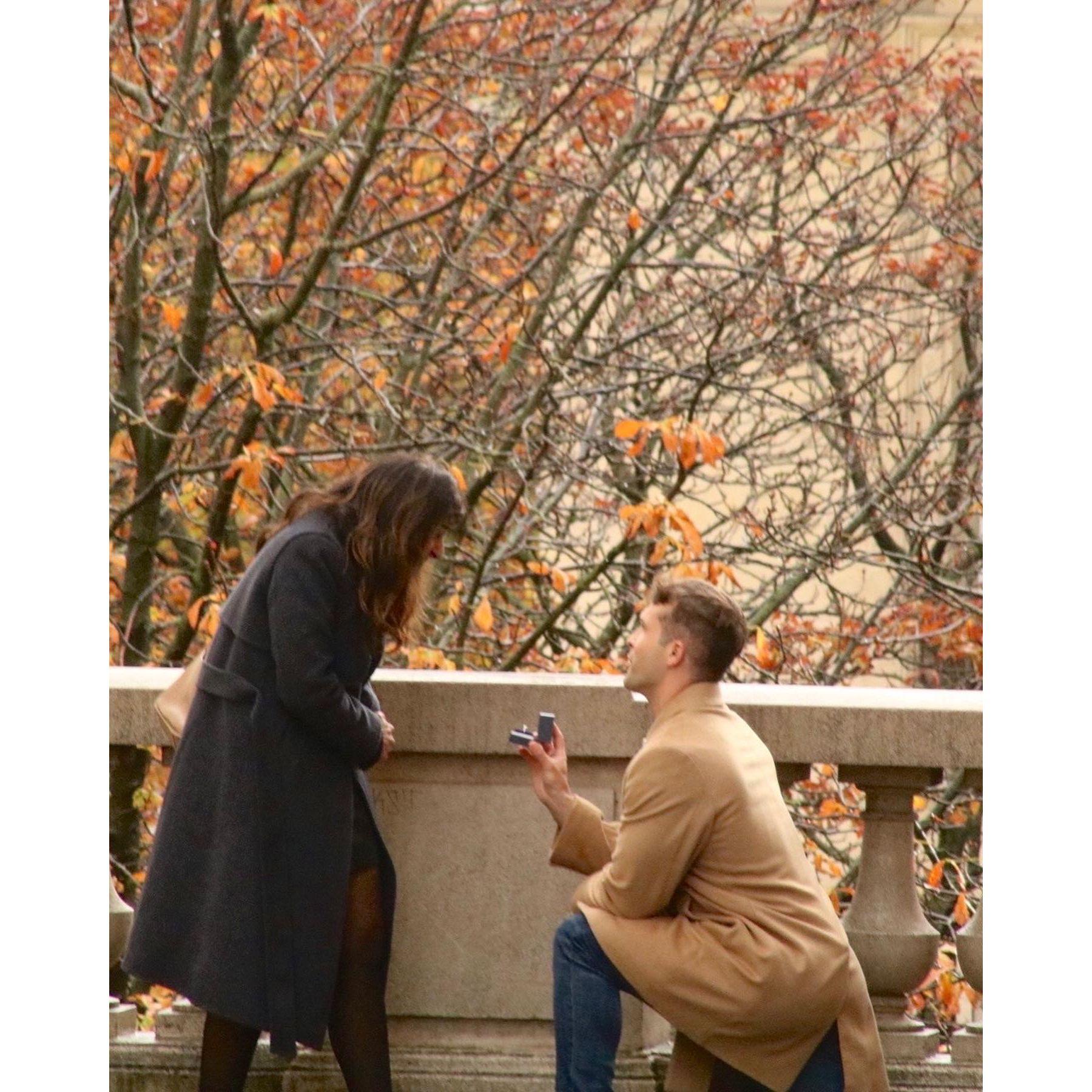 Taken by Sam's friend Renaud as Sam popped the question near the Eiffel Tower.