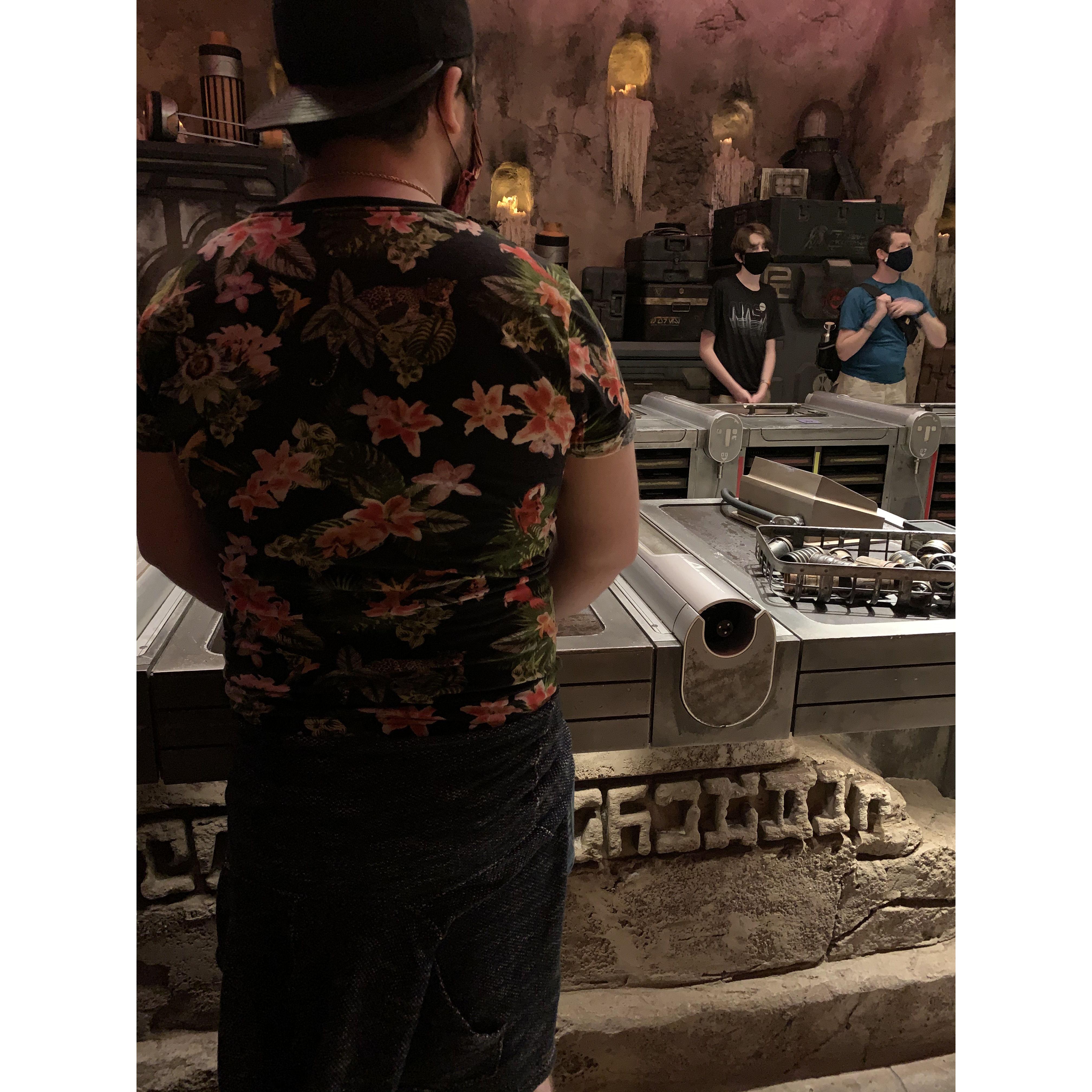 Matt getting his LightSaber in Florida when he came to visit