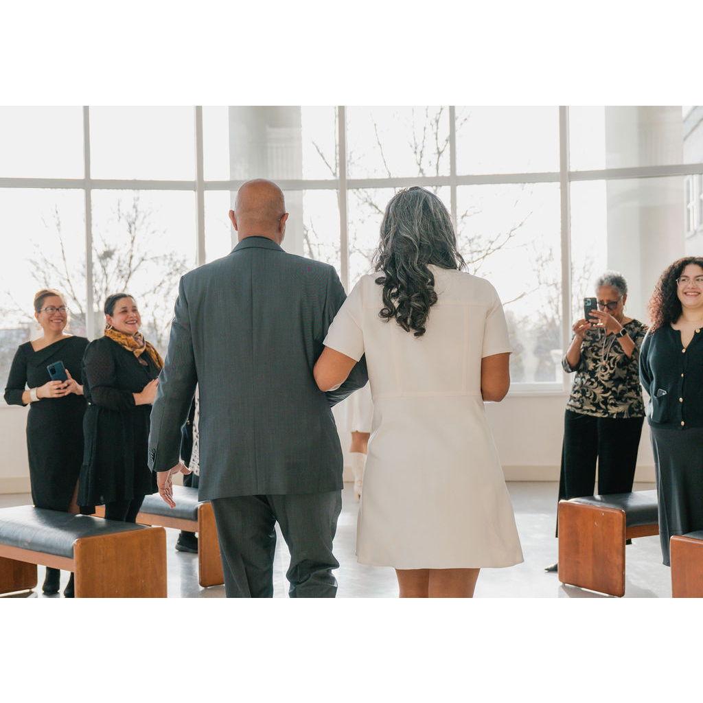 A sunny day inspired an impromptu ceremony outside of the courtroom!