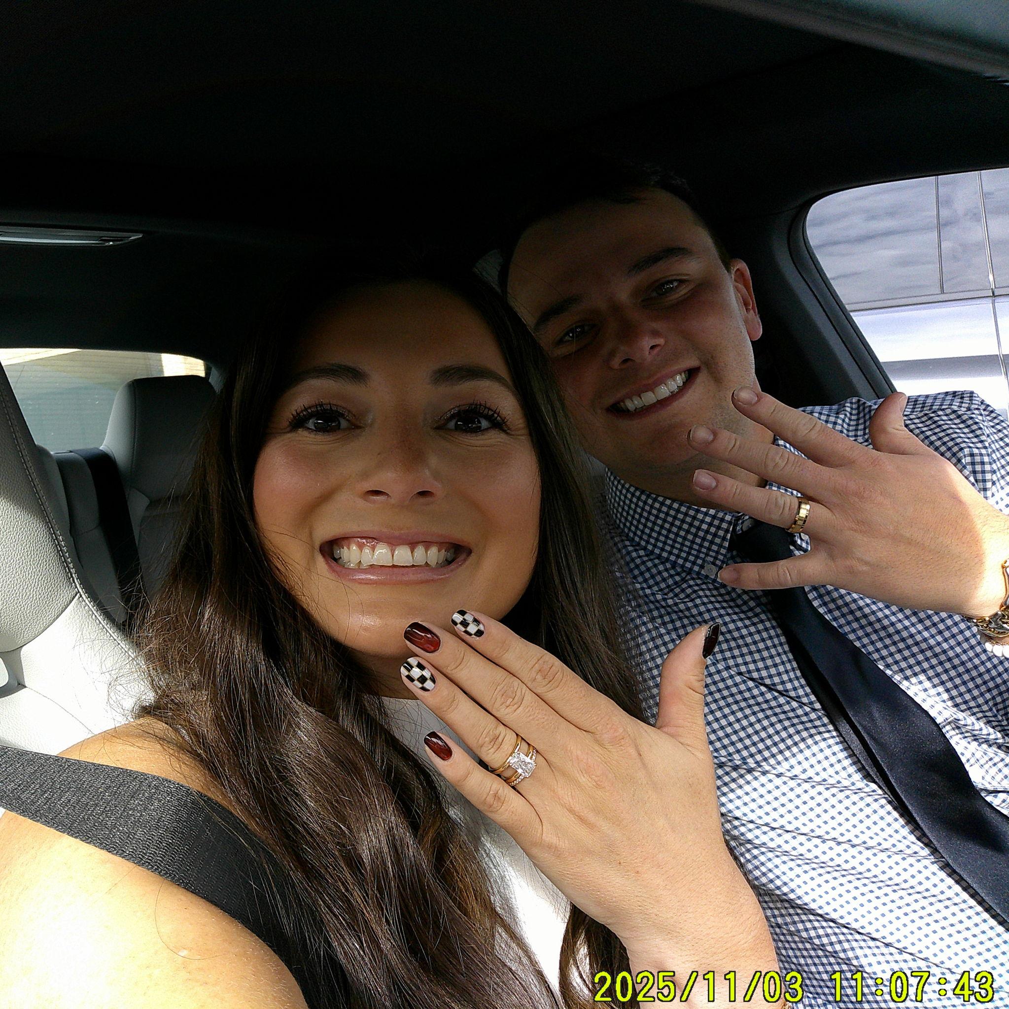 Our first photo with our wedding bands on.