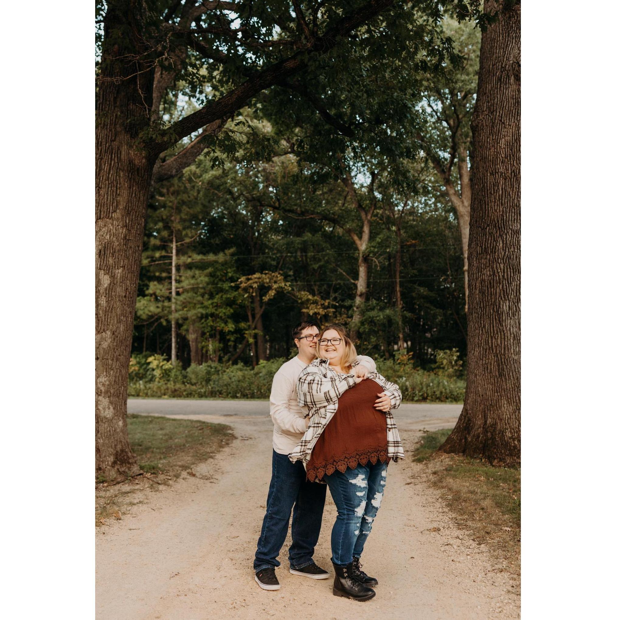 Dancing under some trees during our engagement session.
