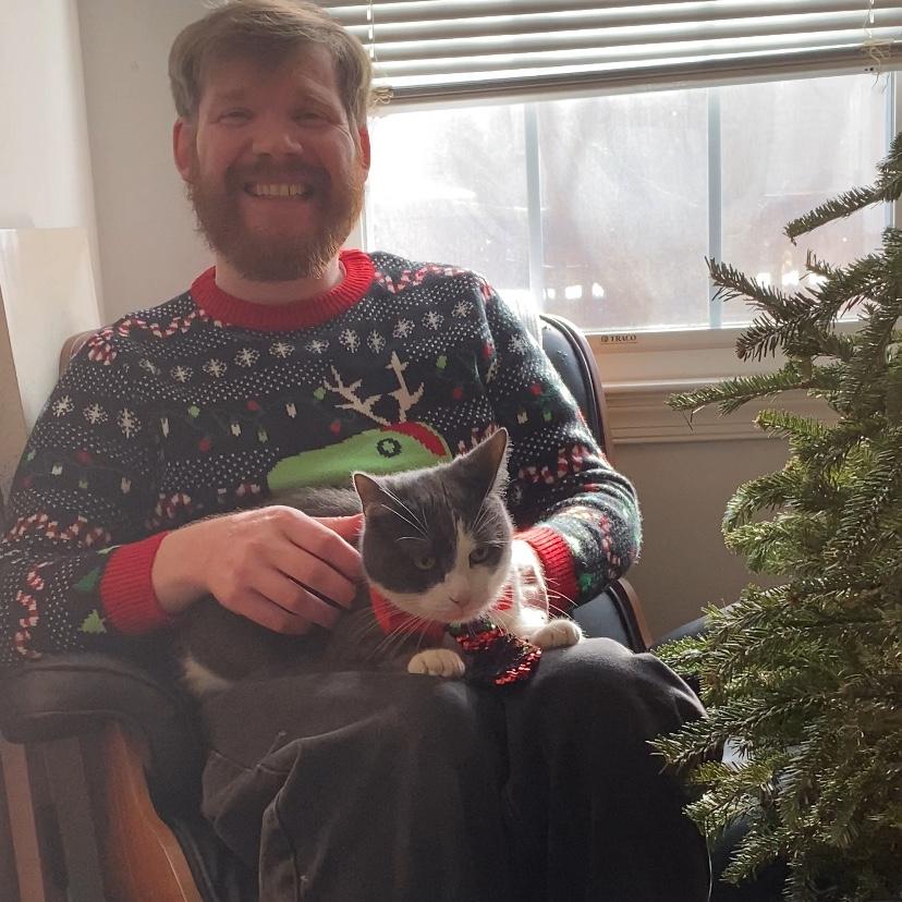 Galen’s first time posing for Christmas pics AND wearing a Christmas tie! He was cute and grumpy! We miss this feisty old man!