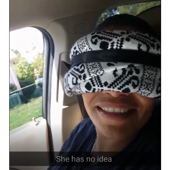 Leona wearing a blind fold for her surprise birthday party 2017