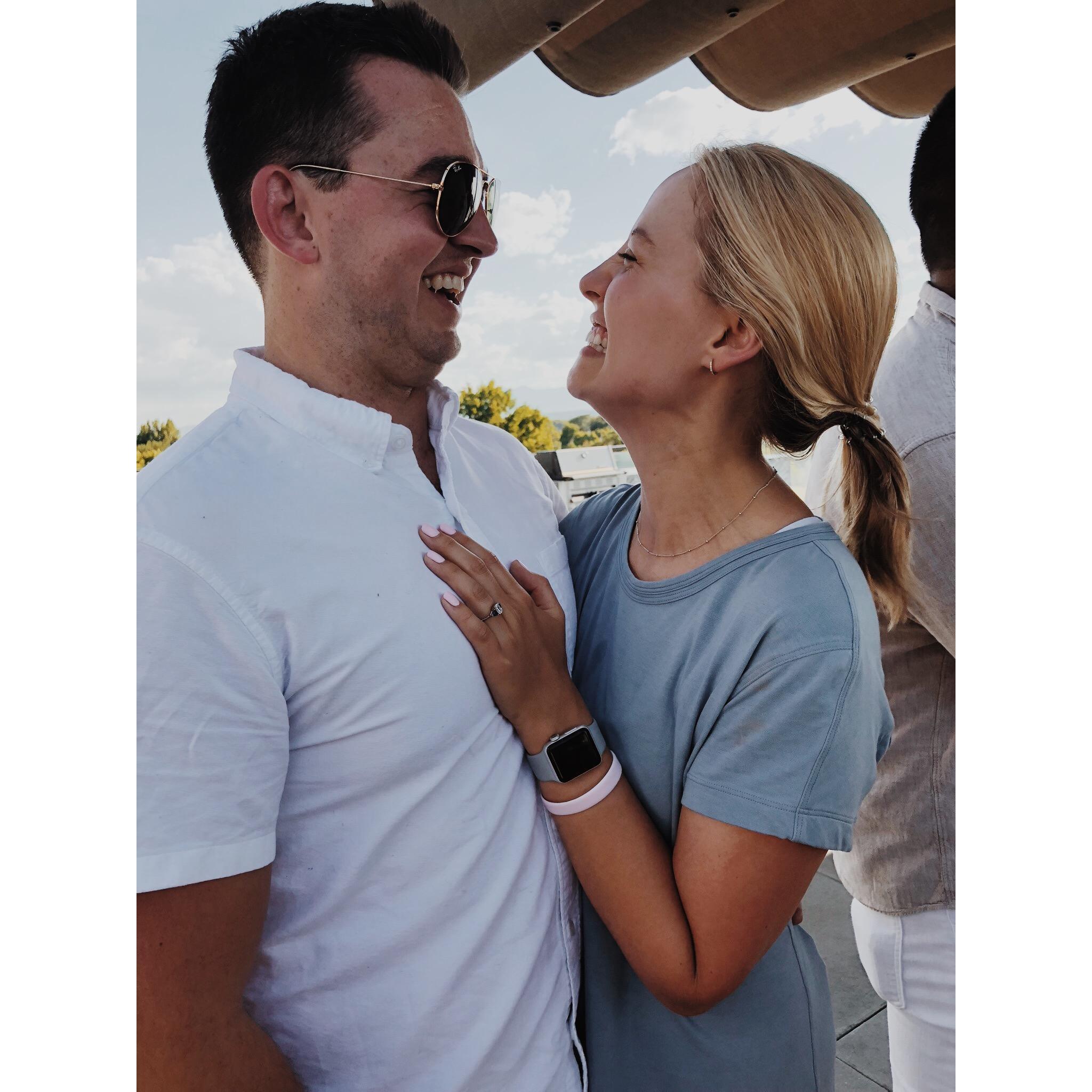 At our engagement party- Jordan surprised Josie with friends and family on the rooftop of our apartment- it was the biggest surprise of the day!