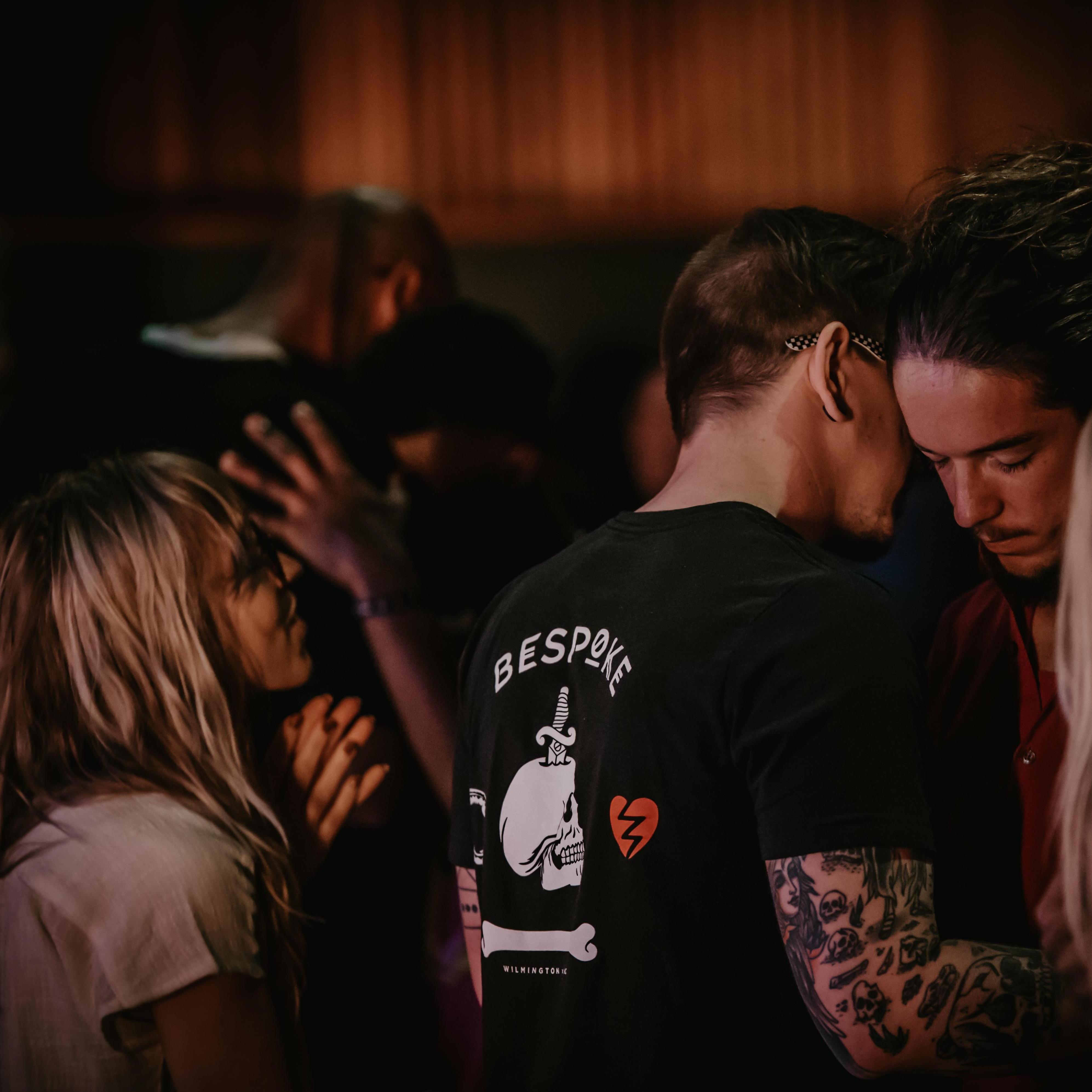 Prior to this picture--I was praying to God asking him what Justin and I would get to do as a couple for Him; the next thing I knew we were asked to go up front and pray with those in need.
