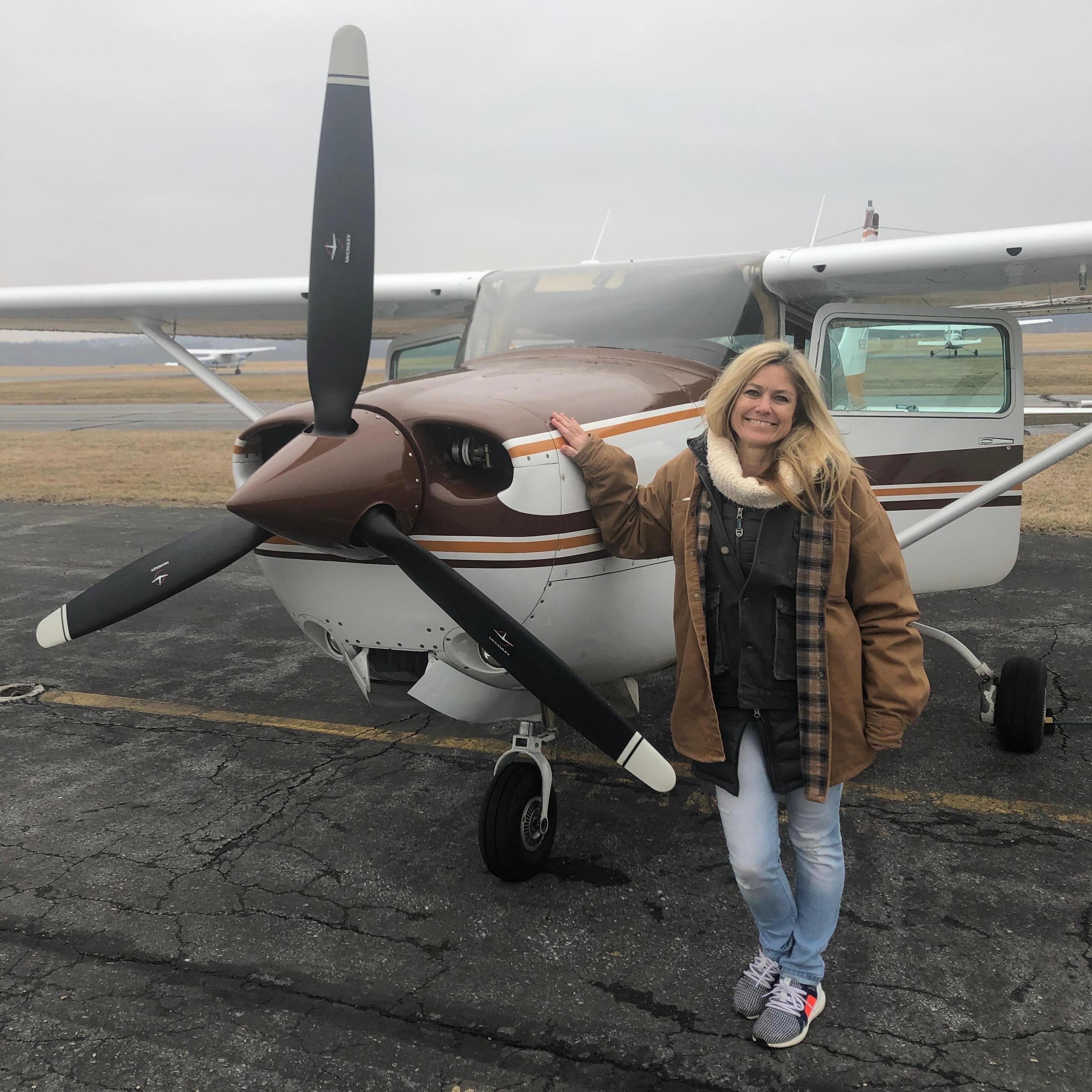 Linda - she get's sick every time we fly, or drive anywhere, but is such a great sport she still gets in the plane with Brenton!