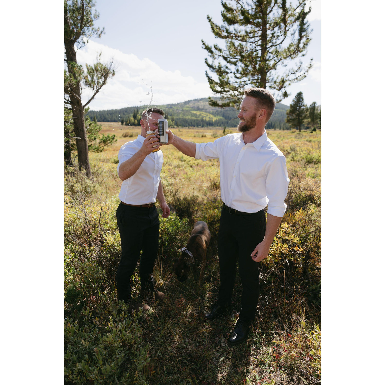 brothers having a celebratory beer