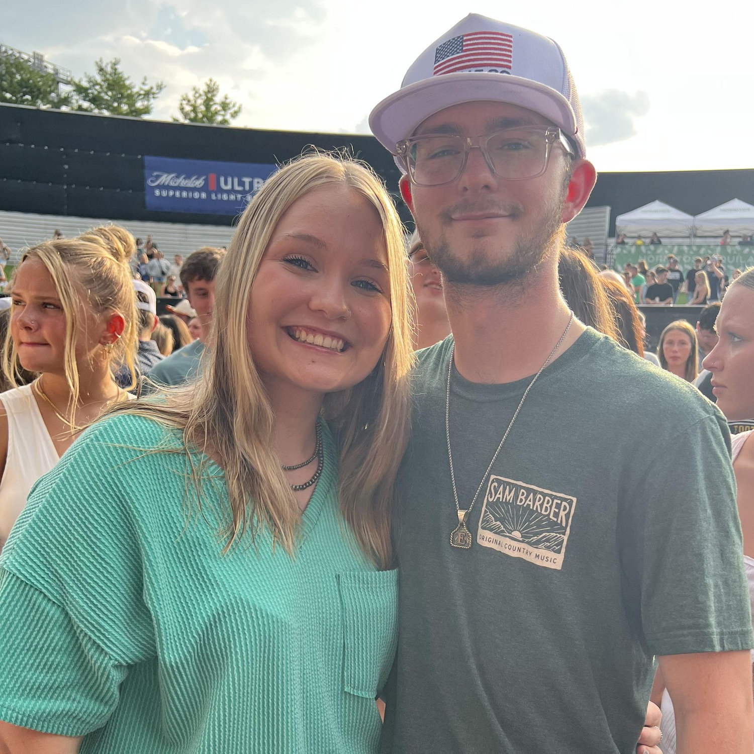 This is us at a country concert less than 24 hours before he proposed :)