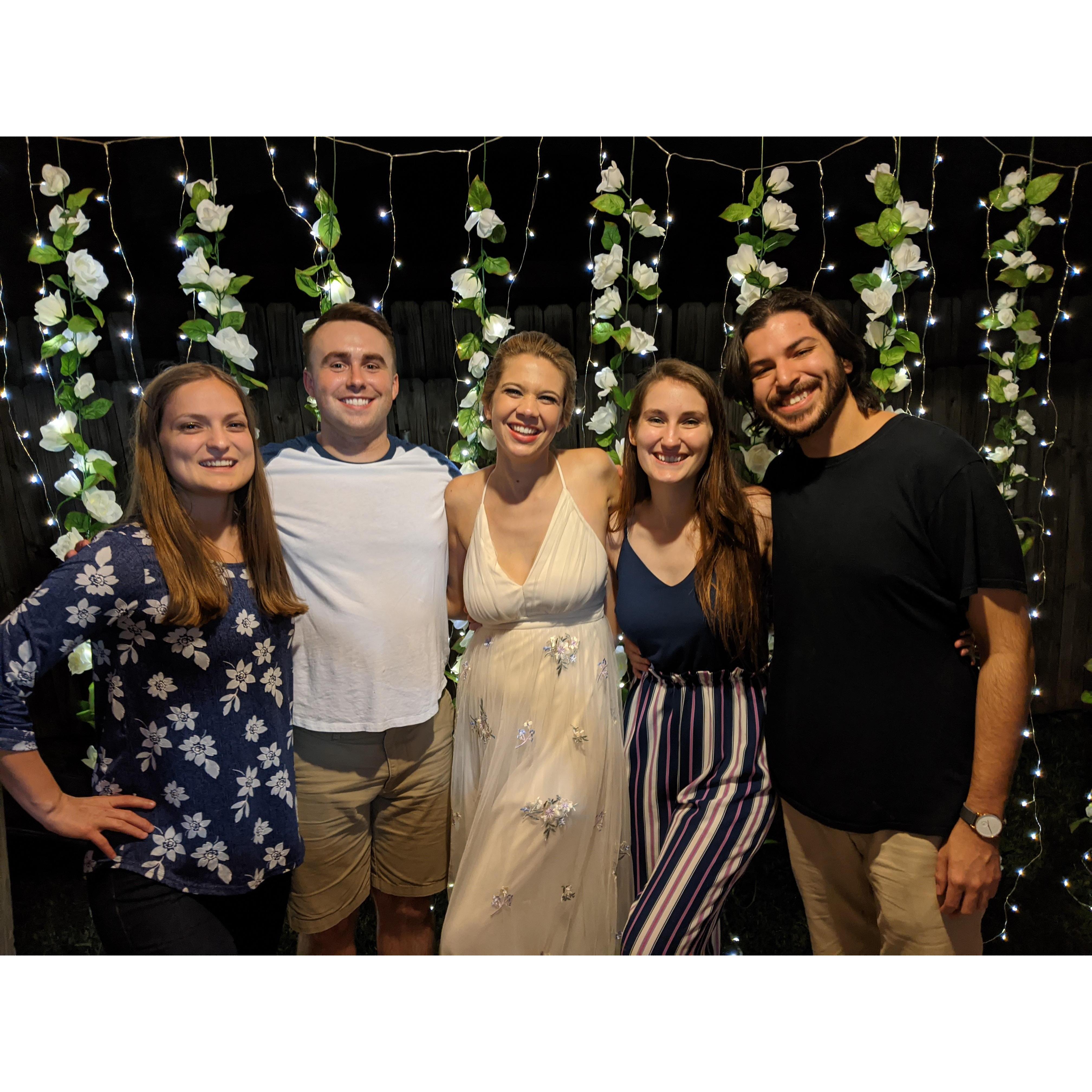 Bridesmaids Sam and Kate, and Sam's husband Nate at Sam and Nate's backyard wedding party