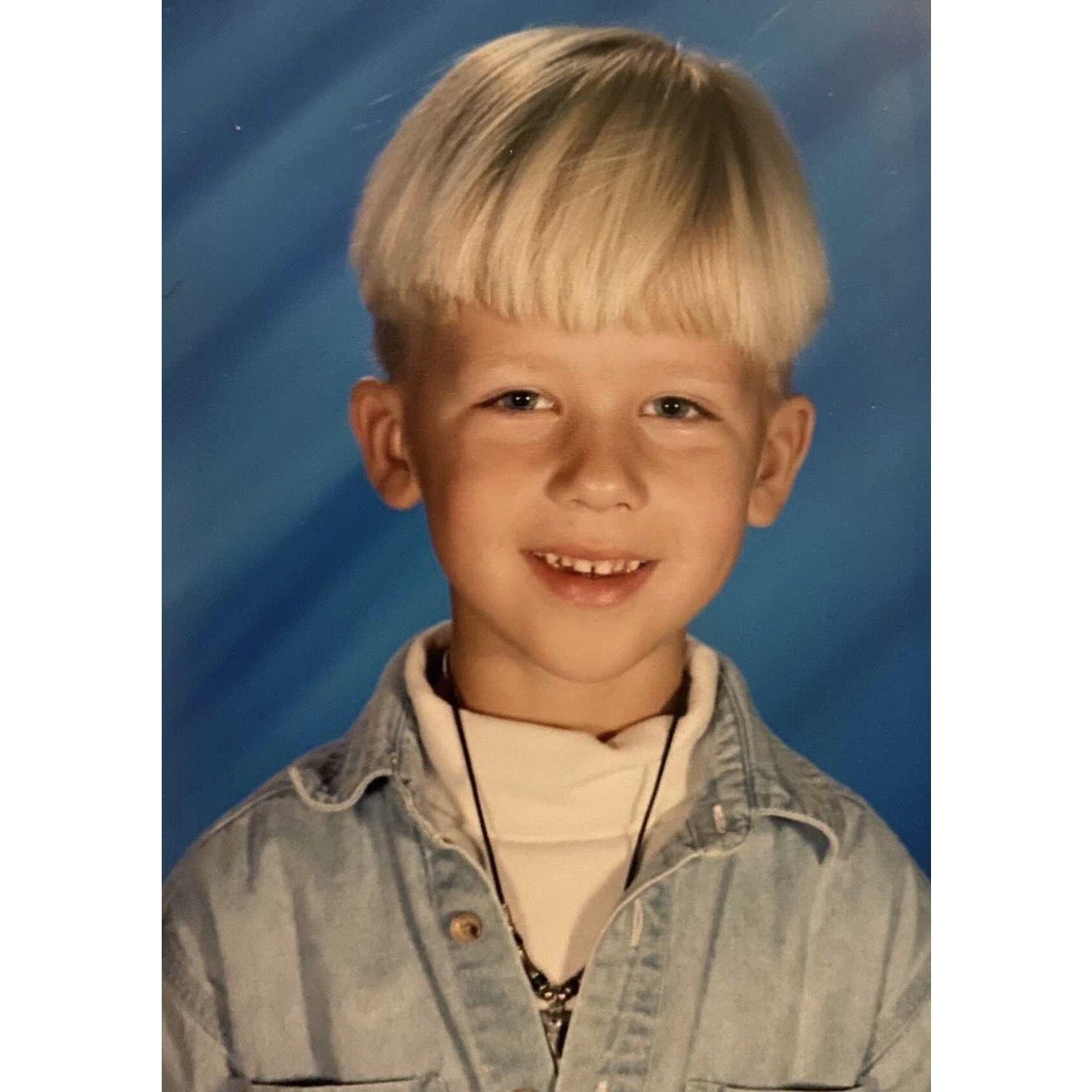 Young Nick sporting a lovely blonde bowl cut