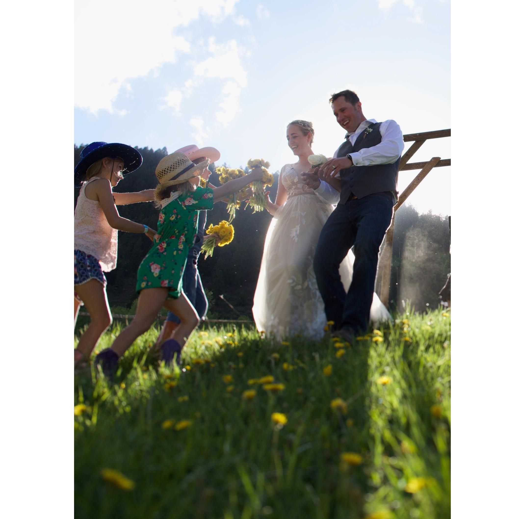 Thank you to all of our beautiful cherub flower girls and boys who, upon their own volition, picked dandelions throughout our ceremony and raced up to give them to us at the end. We love you : )