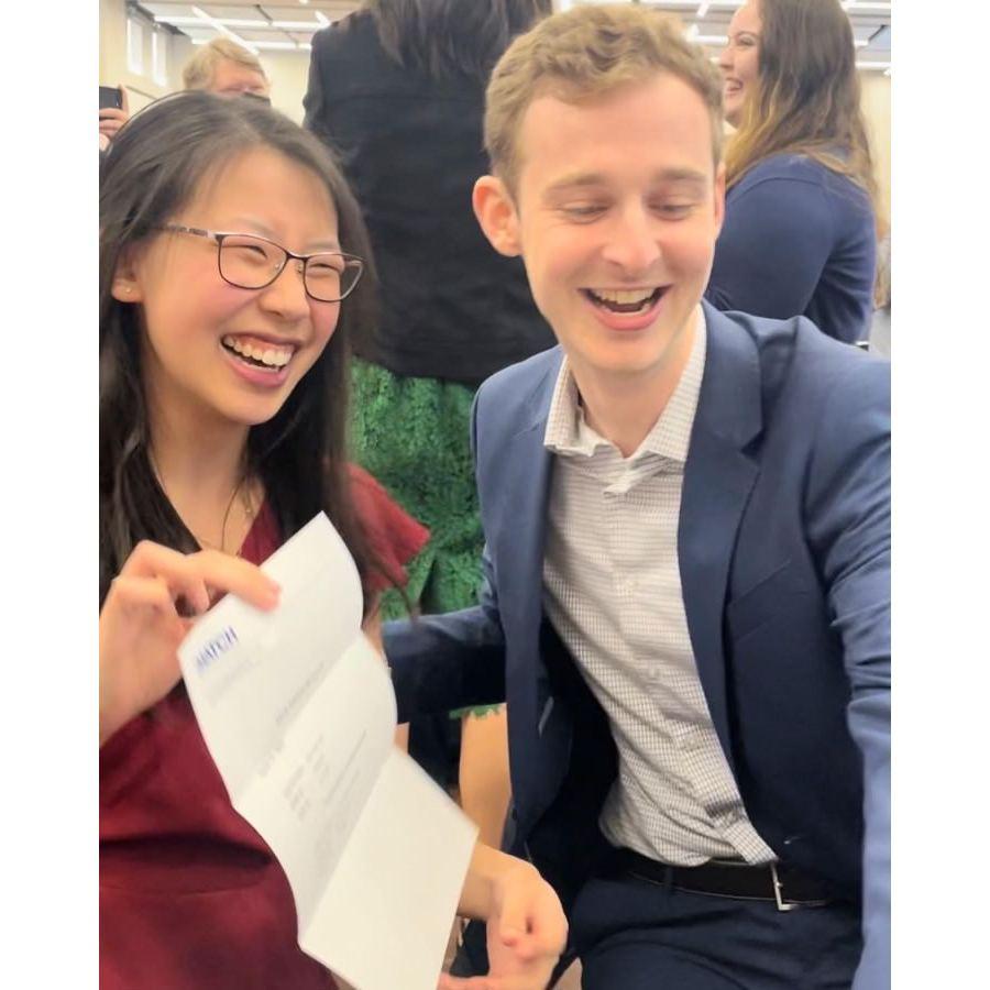 Opening our "Match Day" envelope to find out where we would be going for Kaitlin's residency!